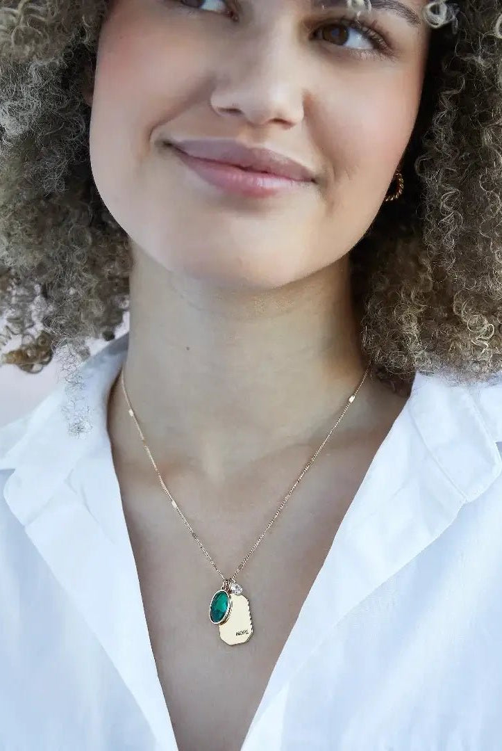 Birthstone Charm Necklace in 14k Plated Gold featuring emerald stone and 'HOPE' tag by Foxy Originals.
