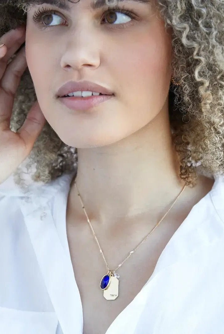 Birthstone Charm Necklace in 14k Plated Gold featuring September sapphire stone and 'TRUTH' charm by Foxy Originals.