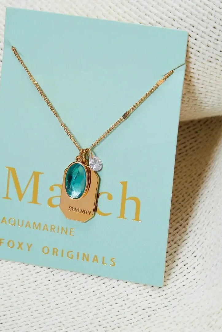 Birthstone Charm Necklace in 14k Plated Gold featuring aquamarine stone and serenity intention for March.
