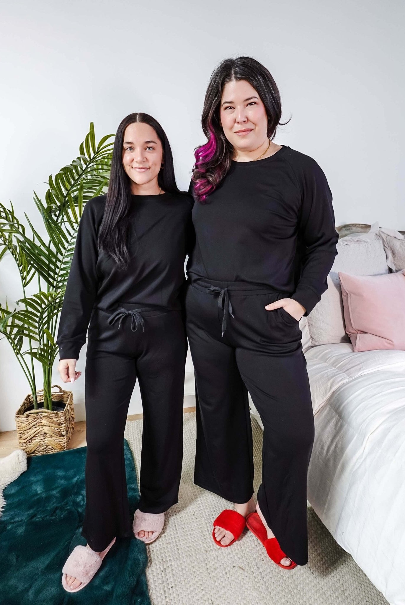Black Long Sleeve Raw Edge Straight Pant Cloud Lounge Set worn by two women in a stylish home setting.