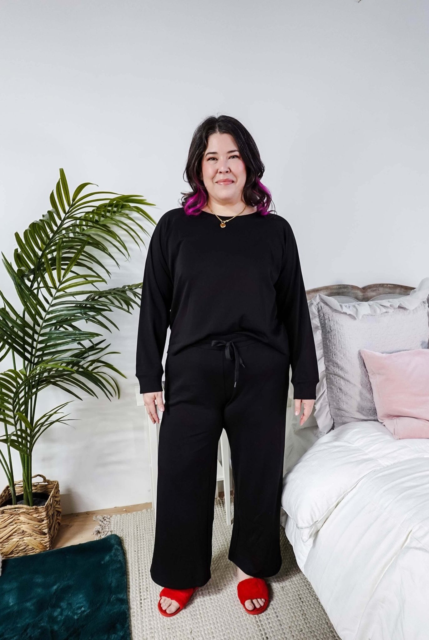 Black Long Sleeve Raw Edge Straight Pant Cloud Lounge Set worn by a model in a cozy home setting.