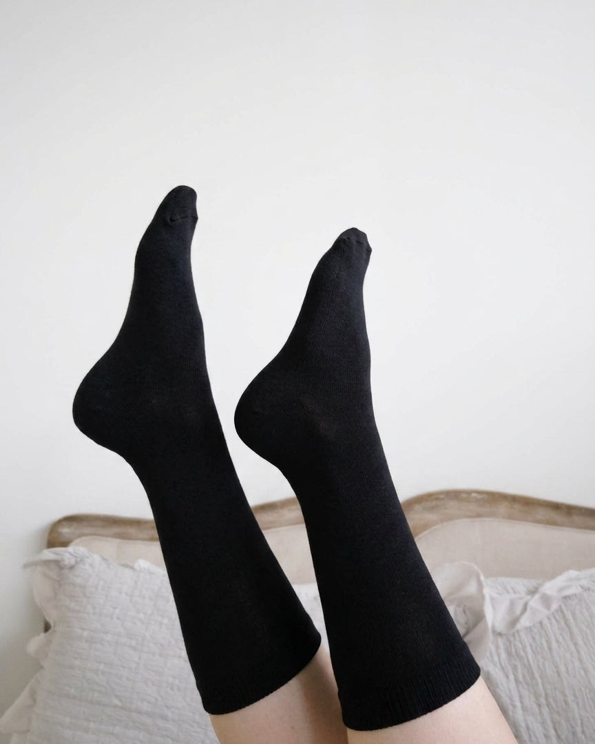 Georgia Rylan black bamboo crew sock lifestyle on model — Cloud Nine Pajamas