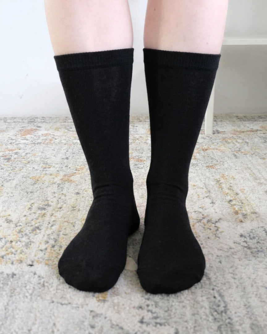 Georgia Rylan black bamboo crew sock on model — Cloud Nine Pajamas