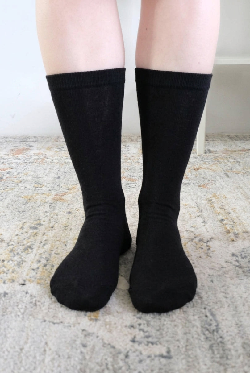 Georgia Rylan black bamboo crew sock on model — Cloud Nine Pajamas