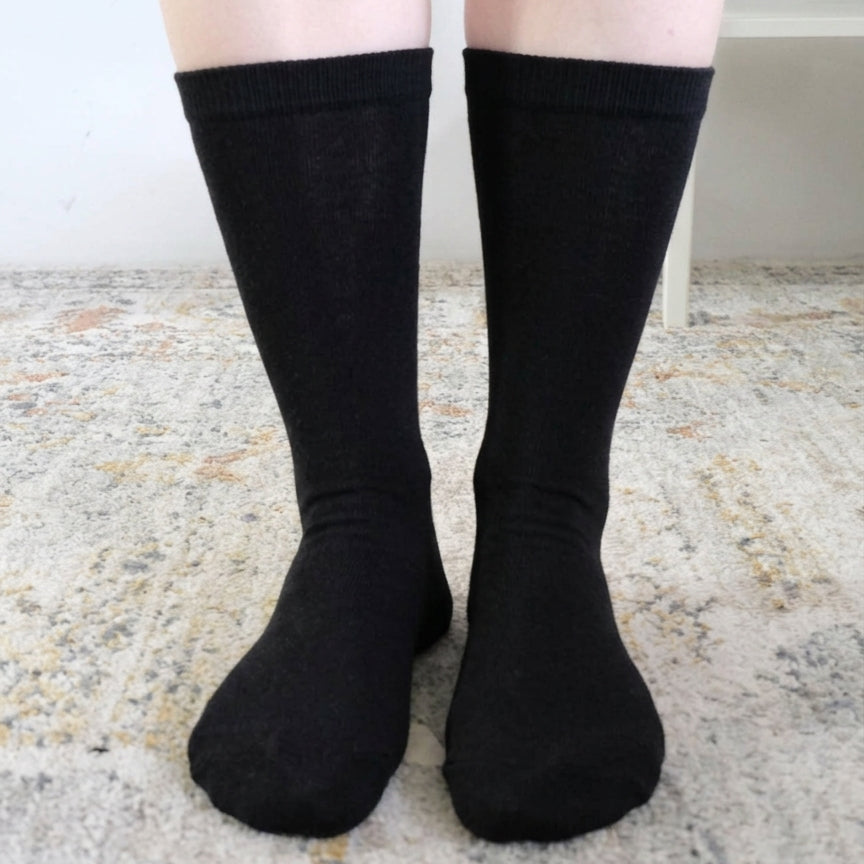 Georgia Rylan black bamboo crew sock on model — Cloud Nine Pajamas
