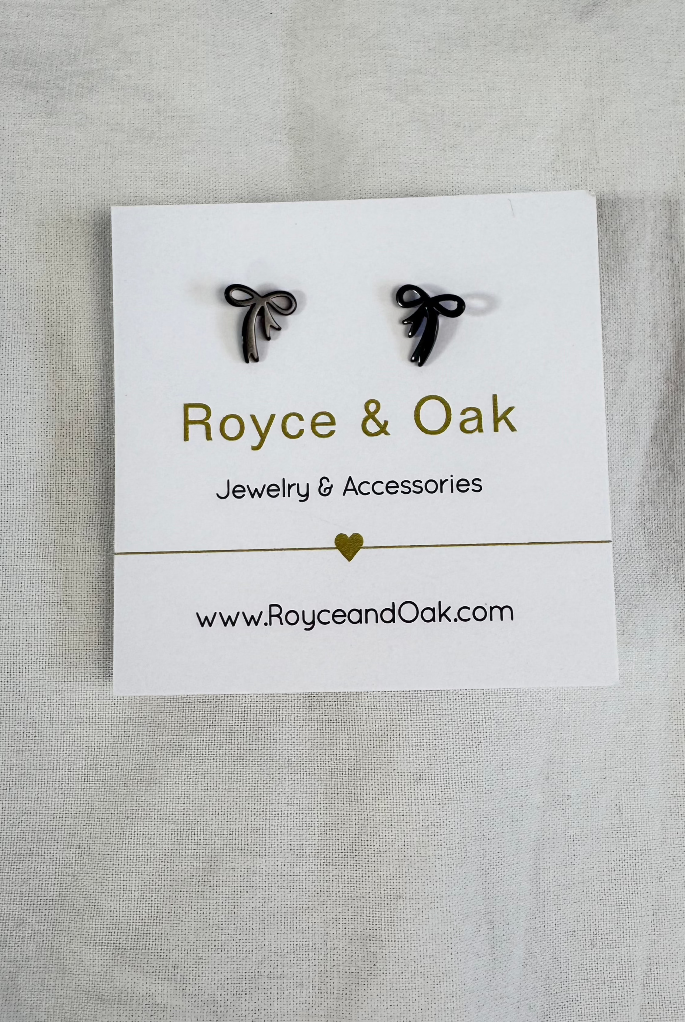 bow earring black royce and oak