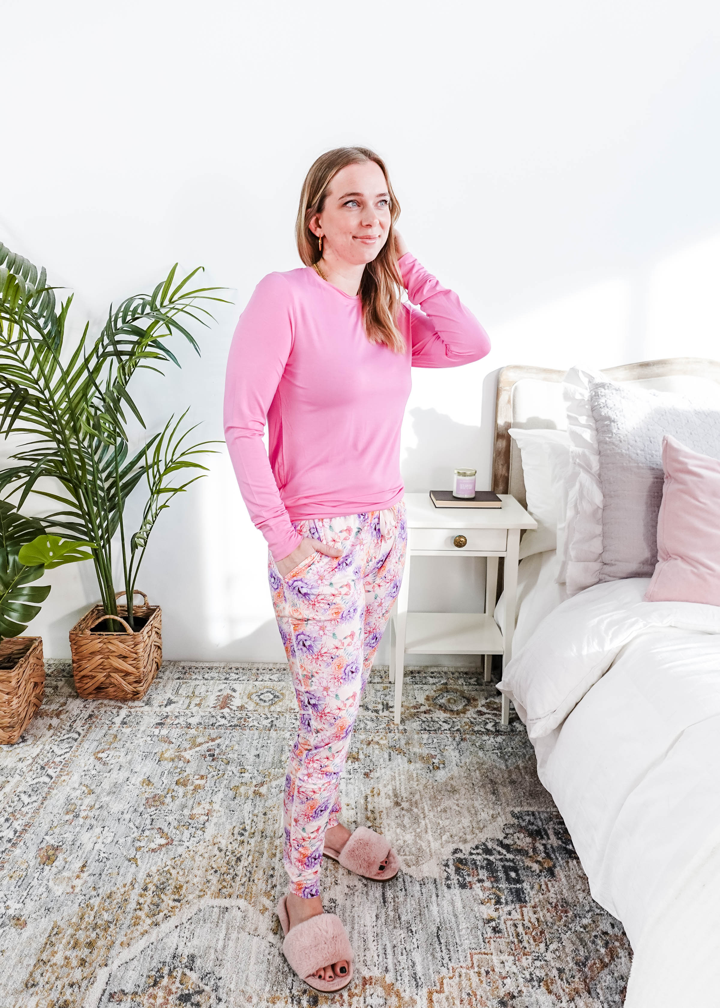 Woman wearing Dream In Blooms Long Sleeve Top & Jogger Bamboo Lounge Set in a cozy bedroom.