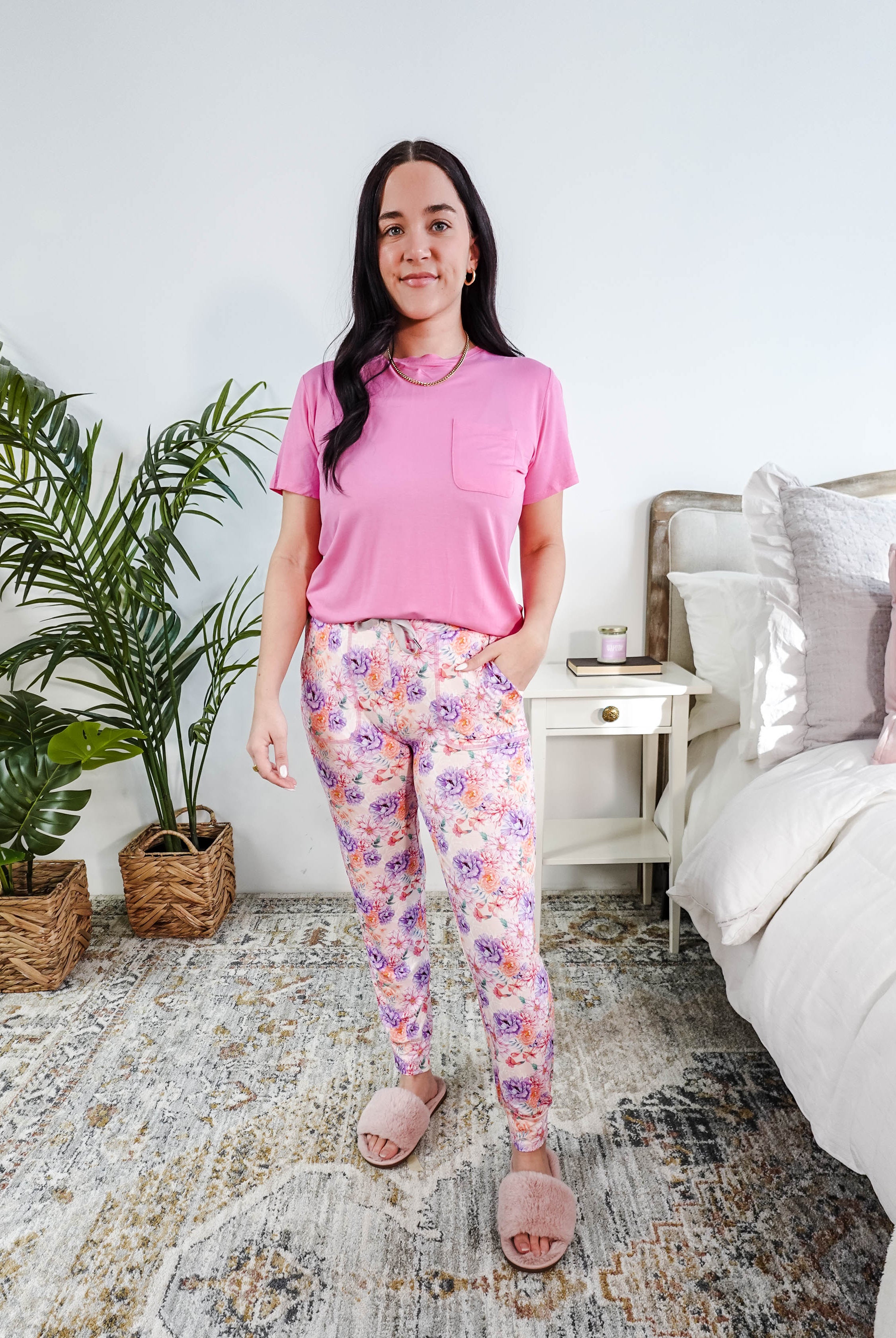 Model wearing Dream In Blooms Tee & Jogger Bamboo Lounge Set, featuring bubblegum pink tee and floral joggers.