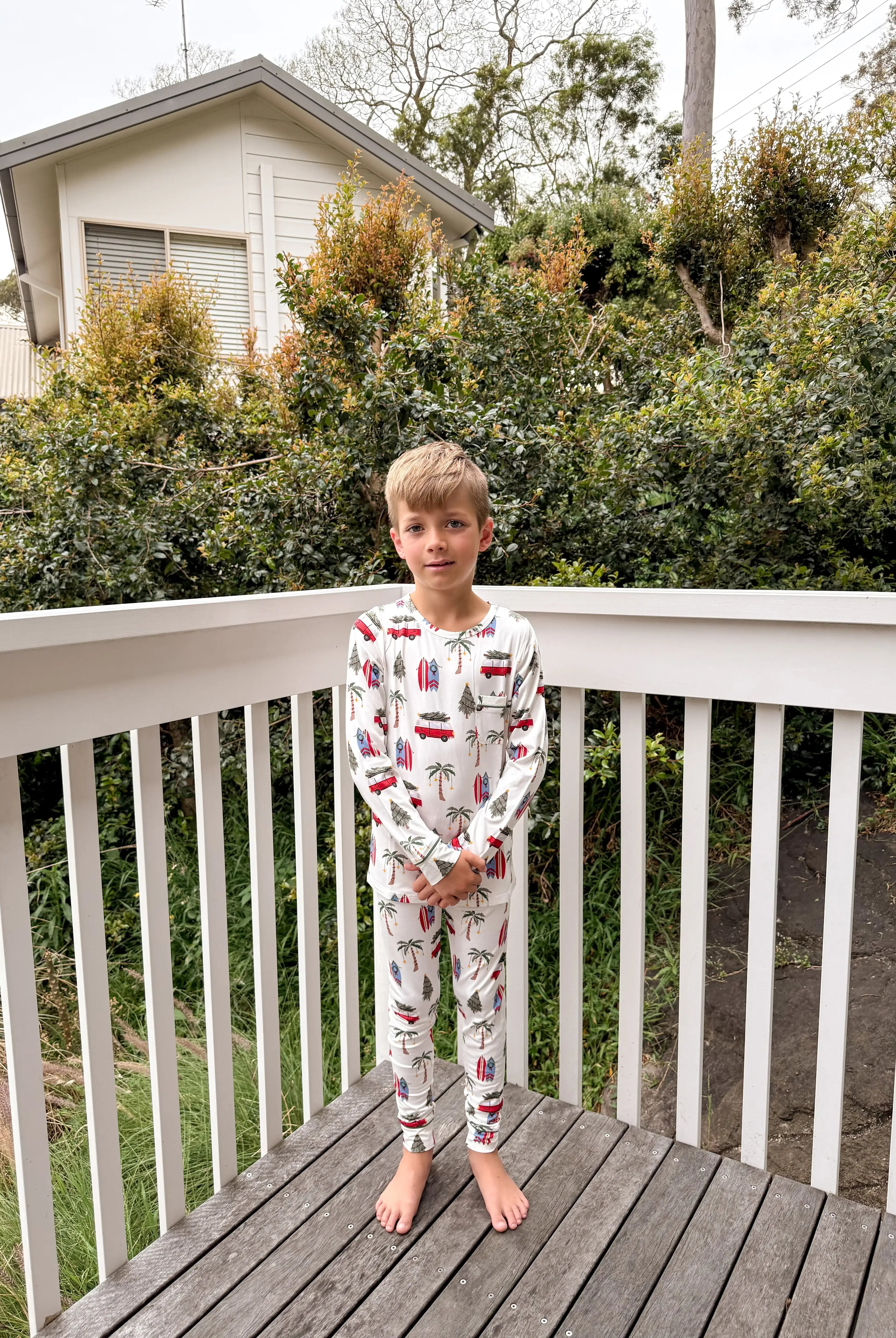 kids matching pj set in bamboo beachy cali christmas print from bambi and birdie