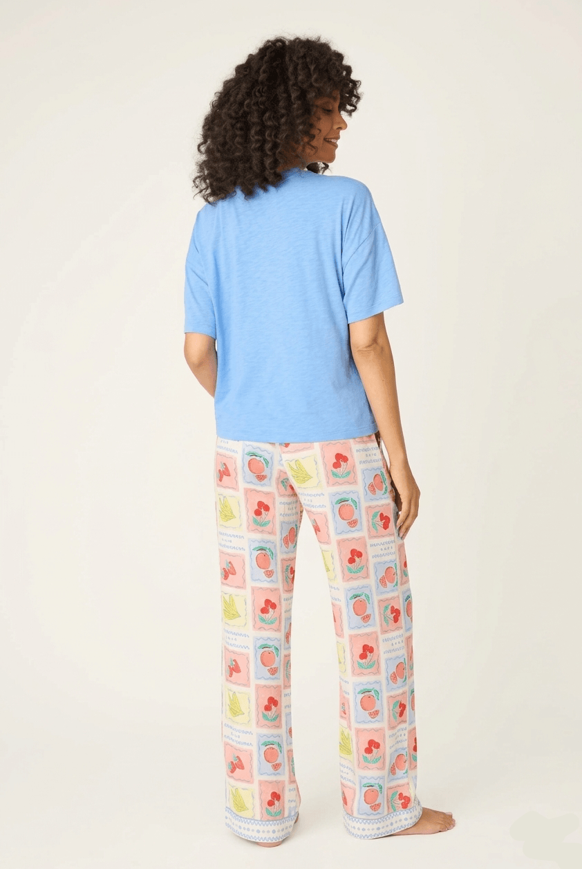 Back view of model wearing the Frutta Fresca Ciao Bella Fruit Print PJ Set by PJ Salvage.