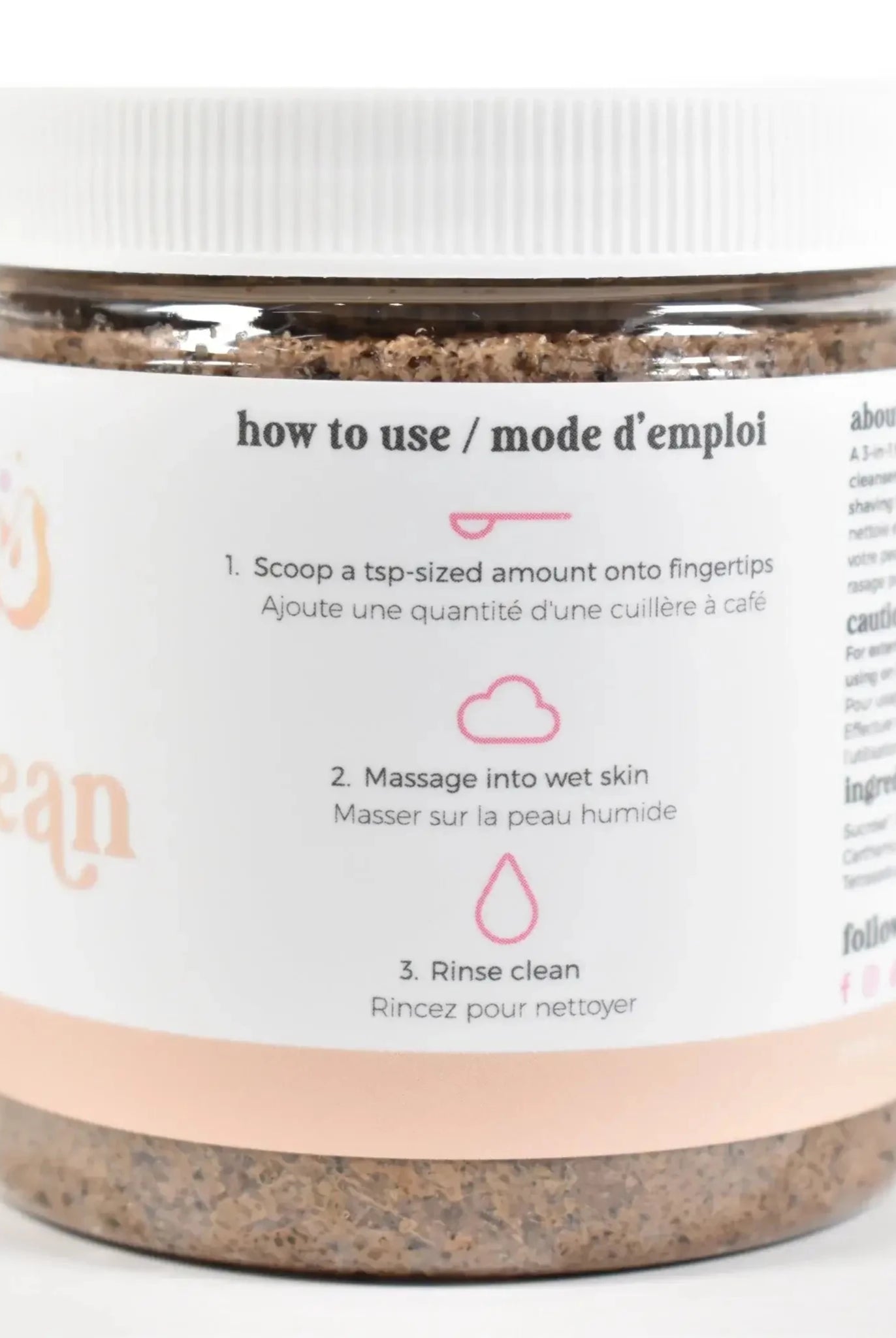 Coffee Bean Sugar Scrub usage instructions on jar for exfoliating and cleansing skin.