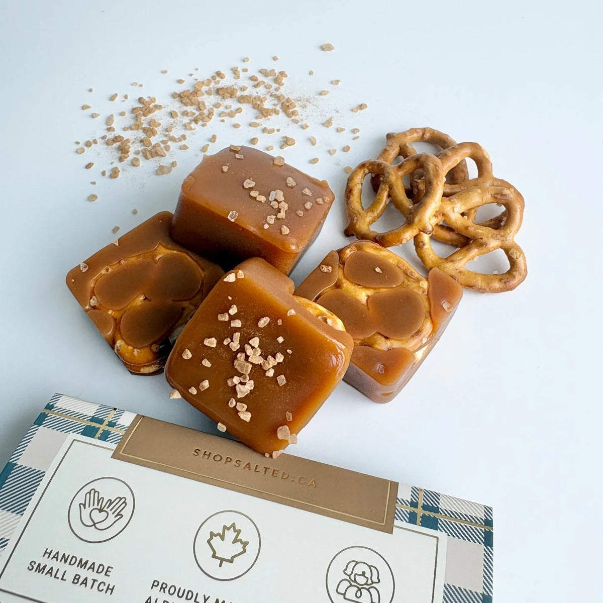 Salted Crisp and Cozy handcrafted caramels close-up apple pretzel salted caramel — Cloud Nine Pajamas
