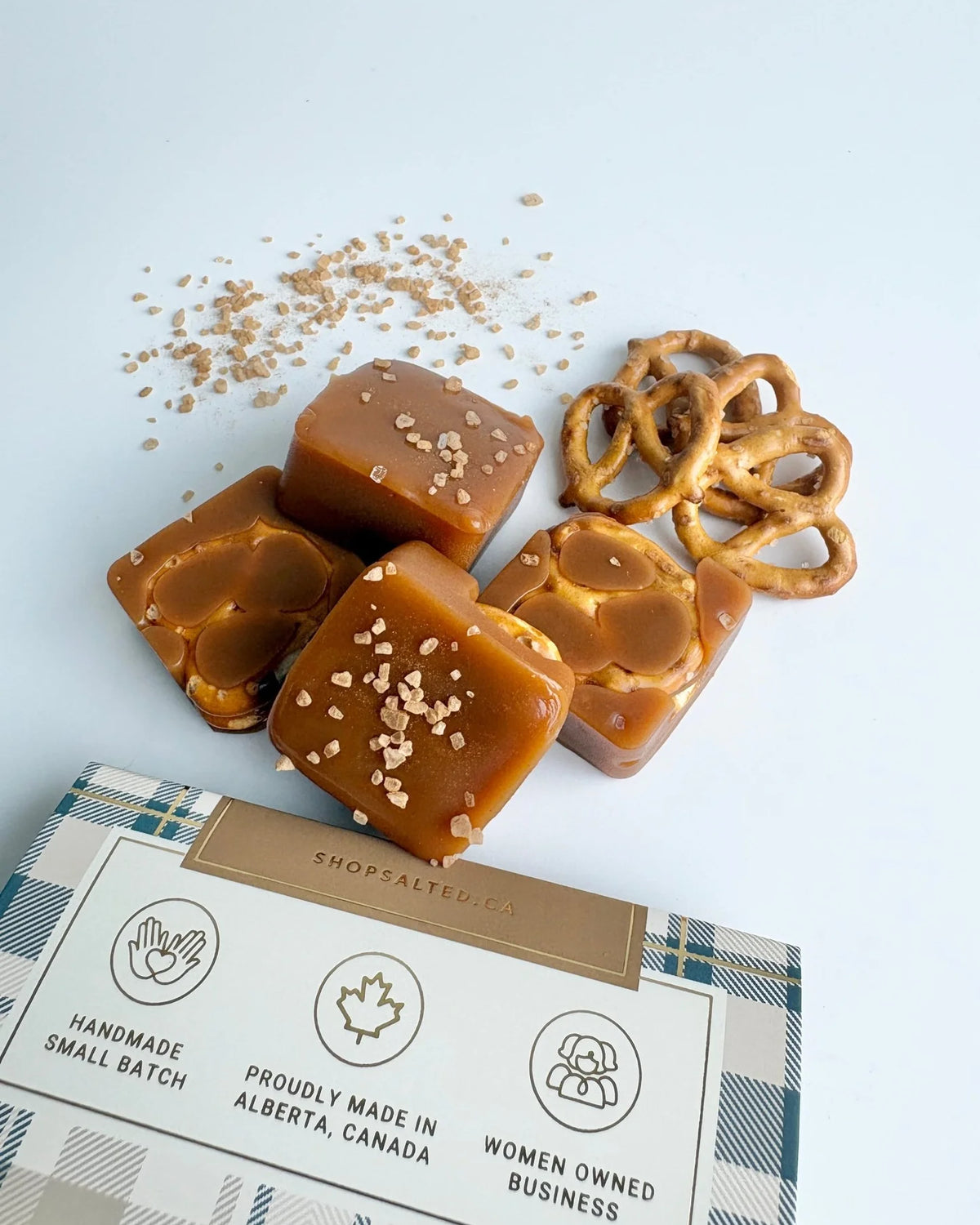 Salted Crisp and Cozy handcrafted caramels close-up apple pretzel salted caramel — Cloud Nine Pajamas