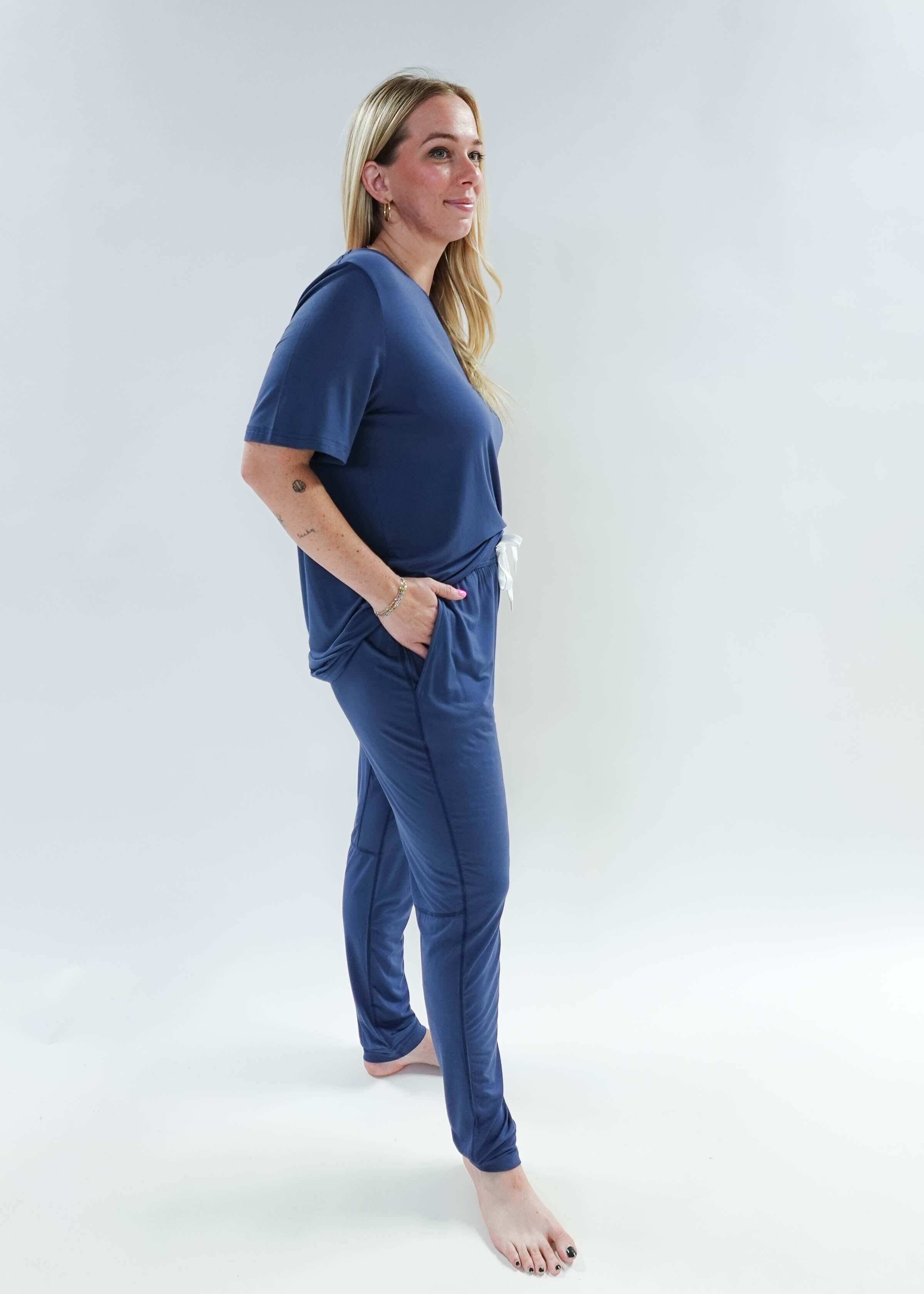 Model wearing Denim Blue Unisex Bamboo Jogger from Bob's Sleepwear Co., showcasing comfort and style.