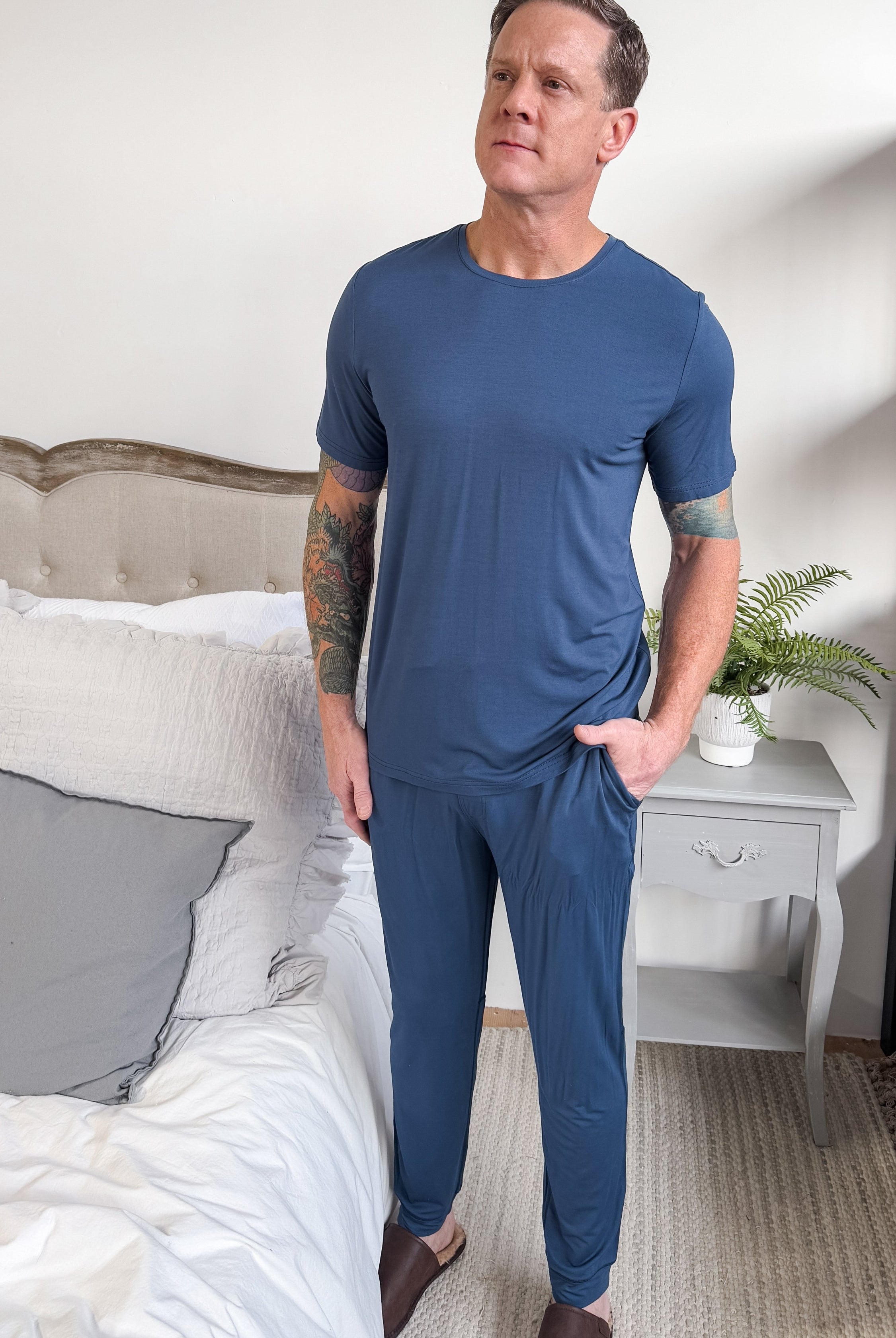 Denim Blue Unisex Bamboo Jogger worn with matching top for a cozy look, featuring soft bamboo fabric.