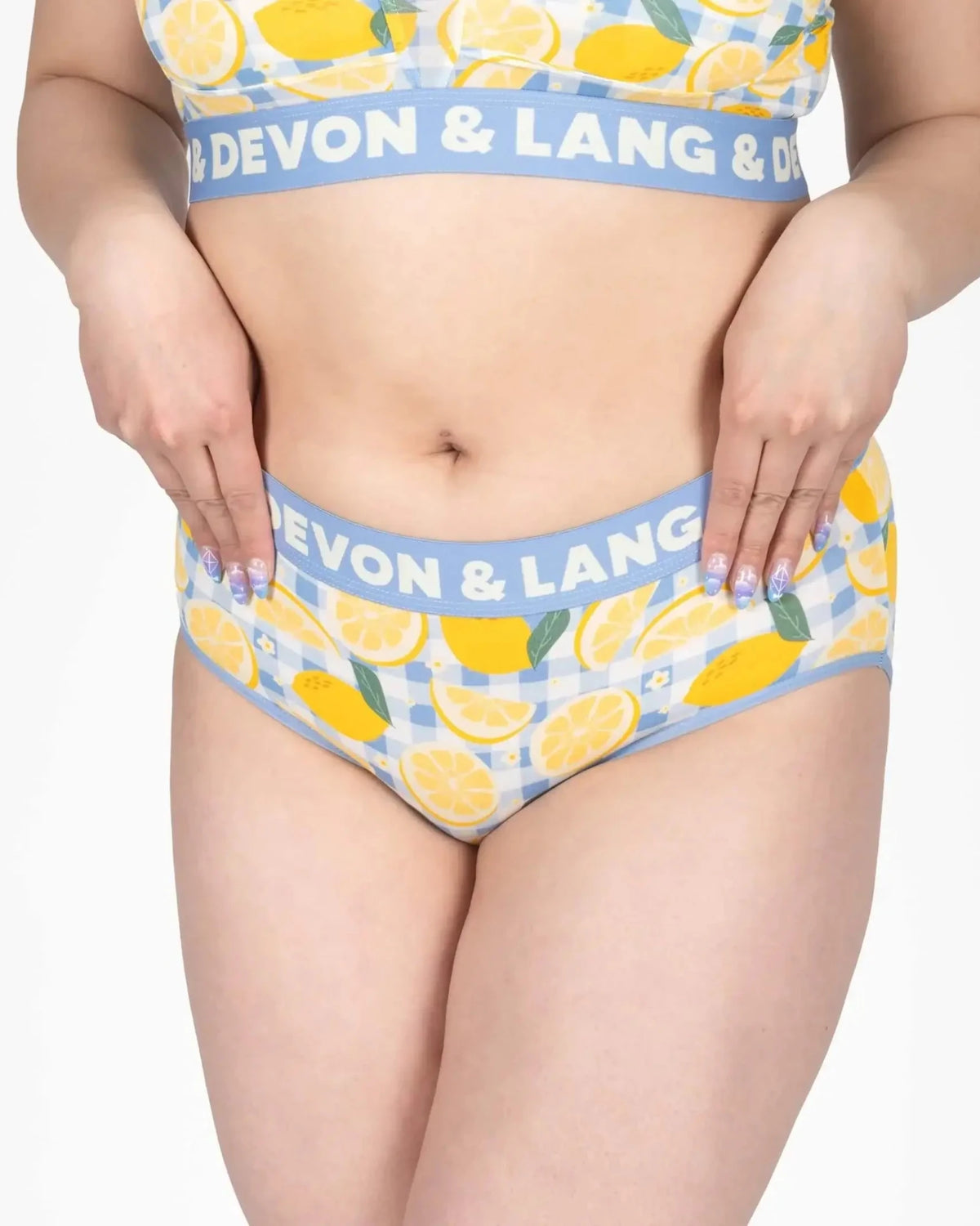 Devon + Lang Bria Full Coverage Bikini Brief featuring a lemon print design and a supportive waistband.