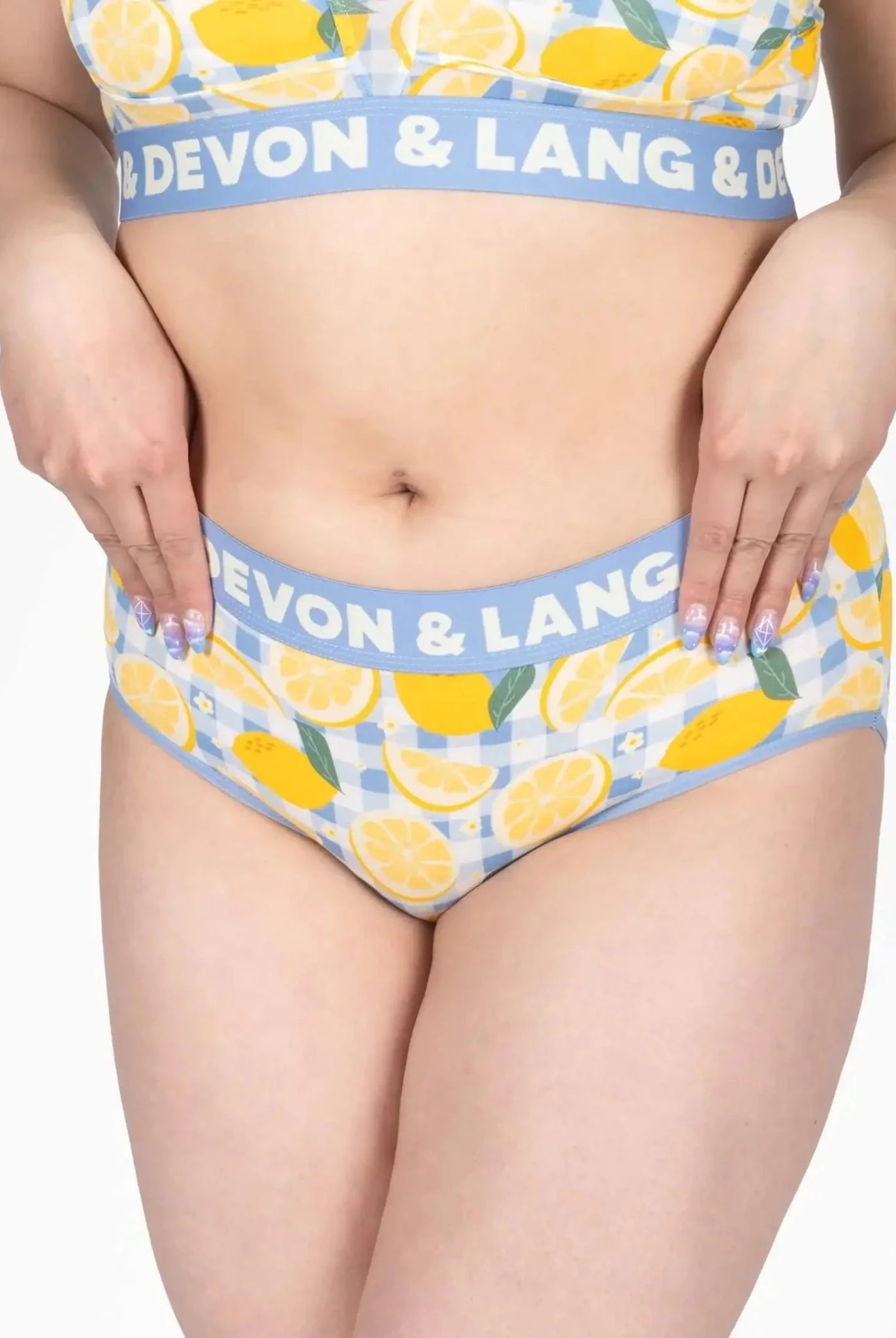 Devon + Lang Bria Full Coverage Bikini Brief featuring a lemon print design and a supportive waistband.