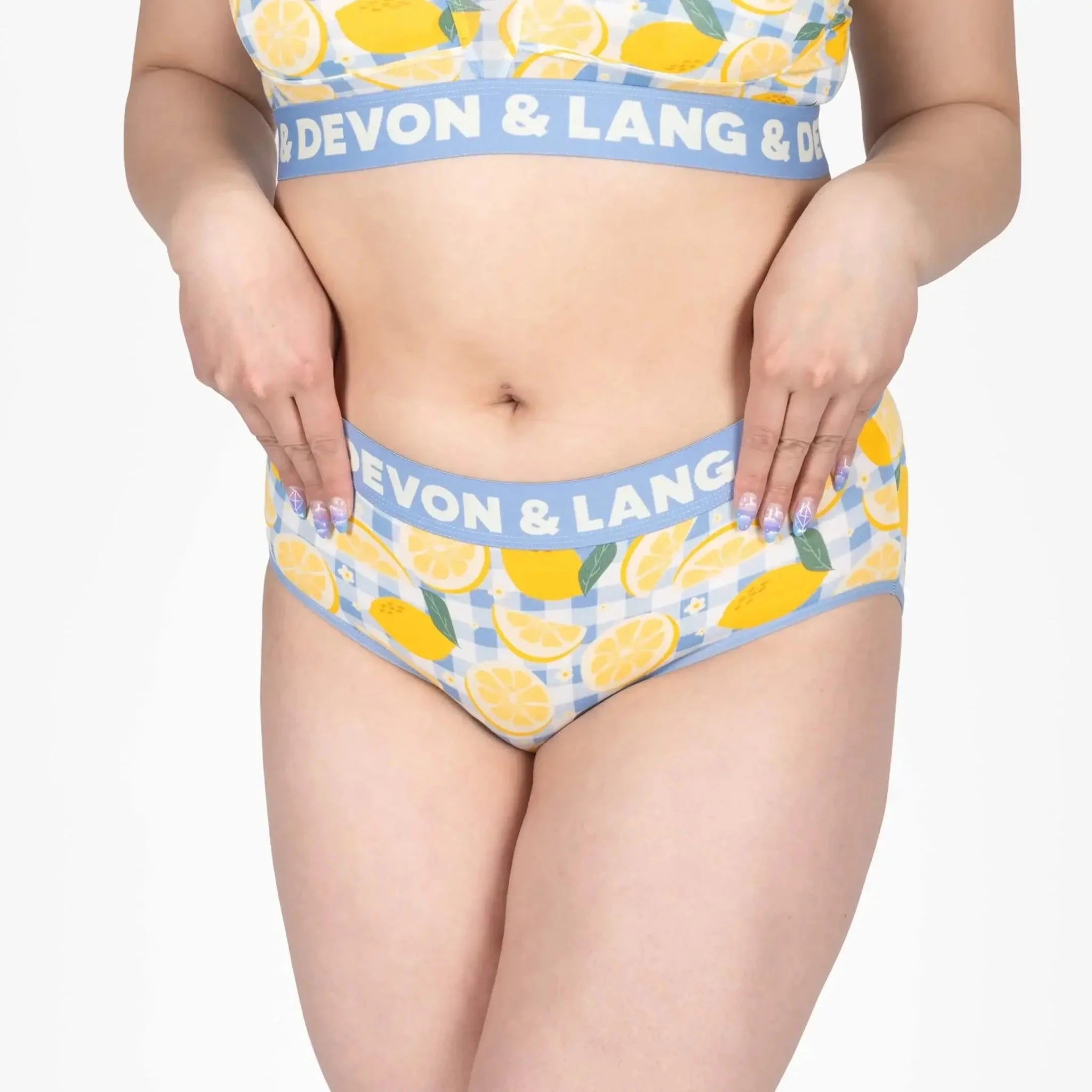 Devon + Lang Bria Full Coverage Bikini Brief featuring a lemon print design and a supportive waistband.