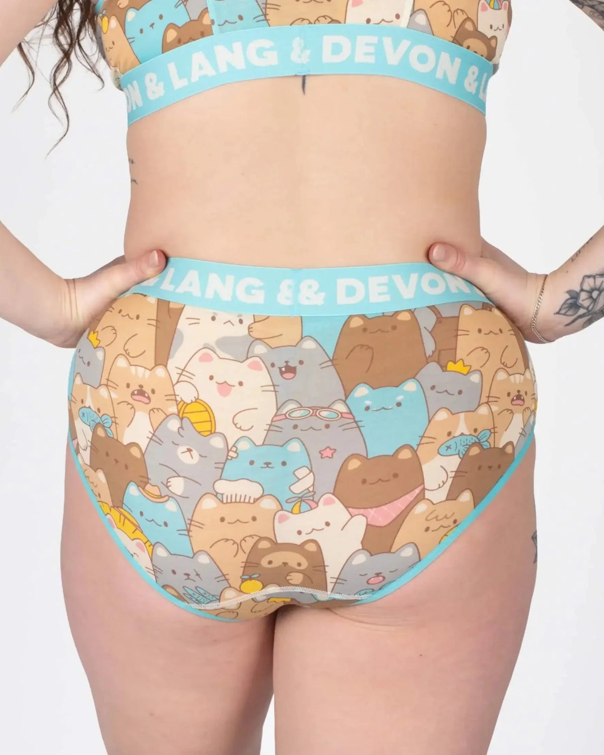 Devon + Lang Bria Full Coverage Bikini Brief featuring a playful cat print and comfortable waistband.