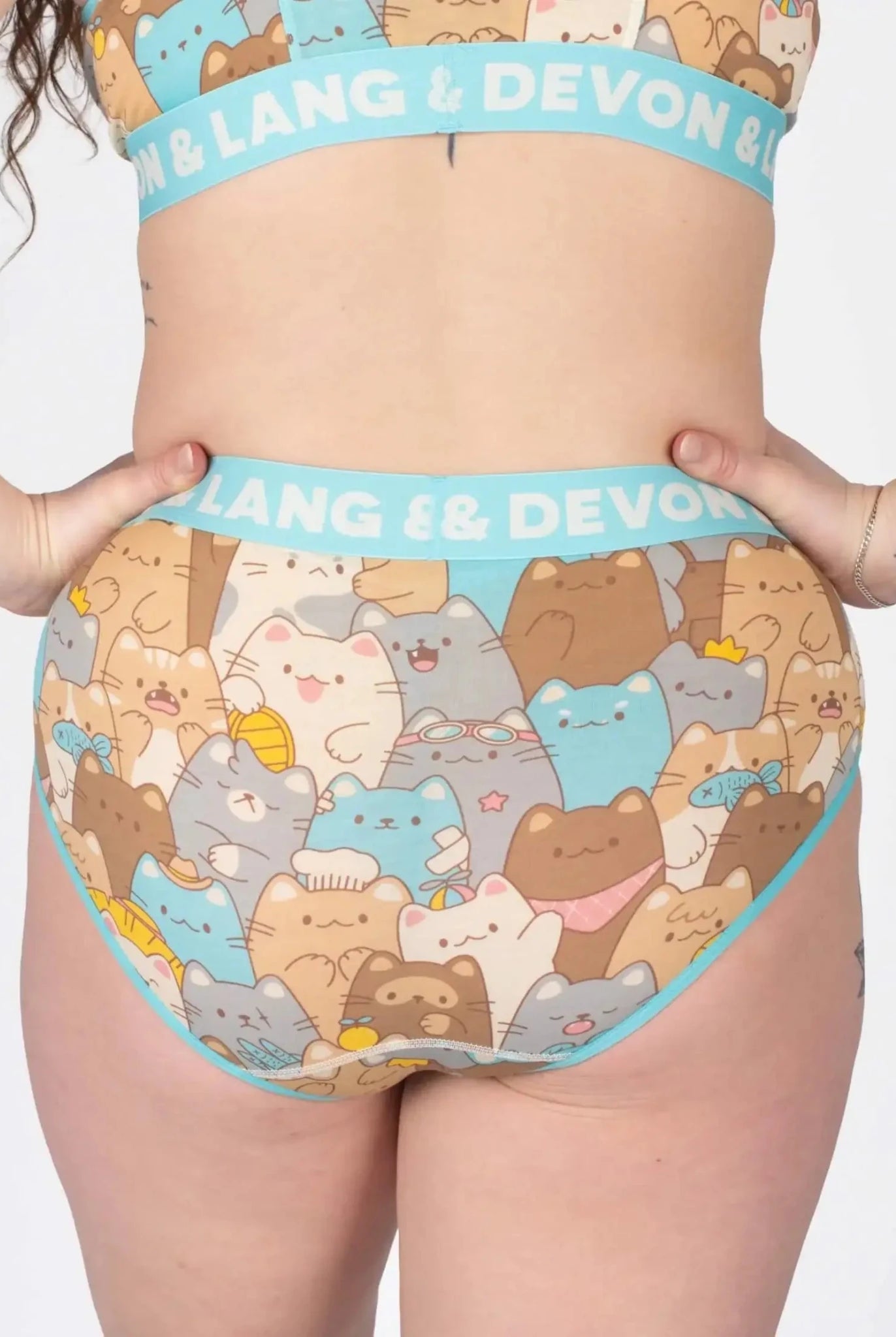 Devon + Lang Bria Full Coverage Bikini Brief featuring a playful cat print and comfortable waistband.