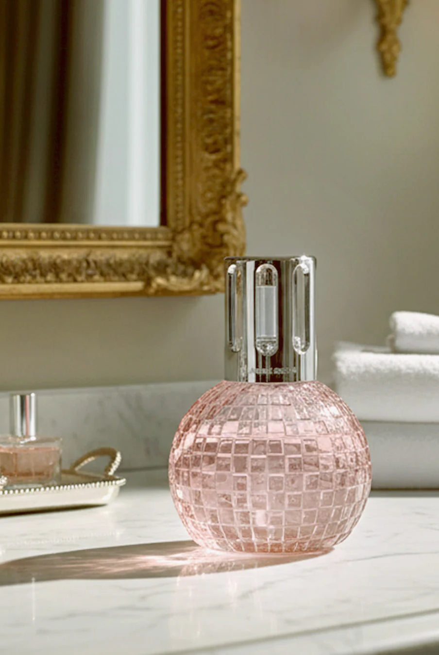 Maison Berger Paris Disco Fragrance Lamp Gift Set featuring a pink lamp and fragrance bottle.