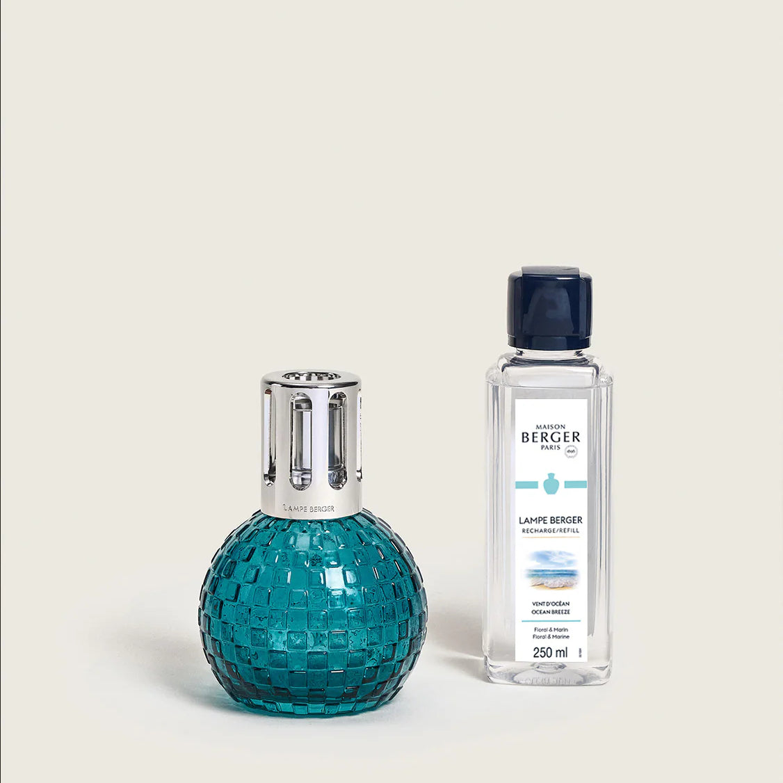 Maison Berger Paris Disco Fragrance Lamp Gift Set featuring a teal lamp and fragrance bottle.