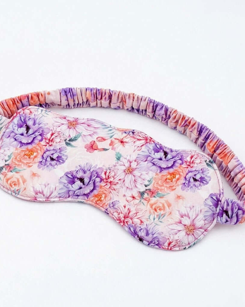 Dream in Blooms Bamboo Eye Sleep Mask featuring a floral pattern for blissful slumber and restful nights.