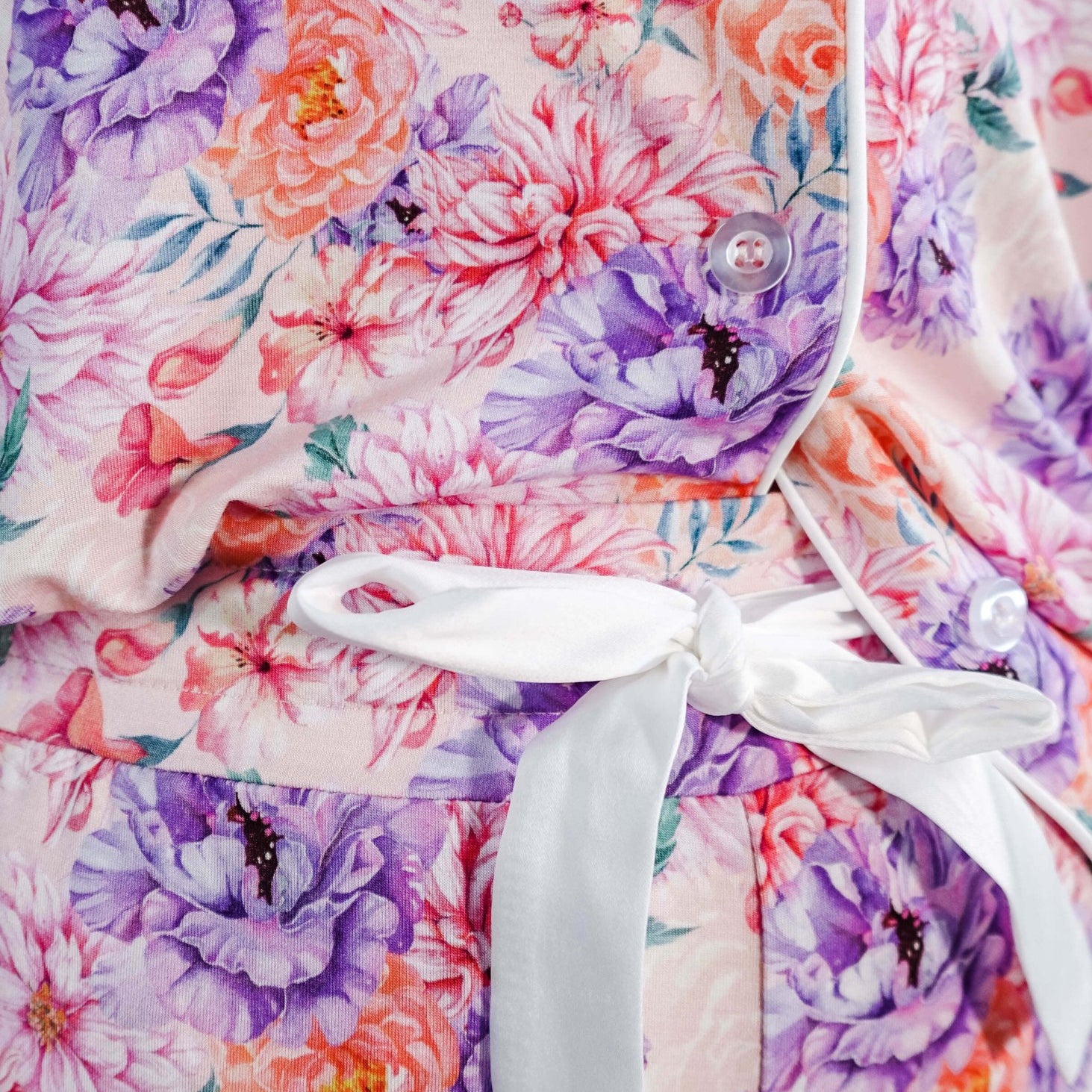 Dream in Blooms Long Sleeve Button Up & Pant Bamboo Lounge Set featuring floral design and white tie detail.