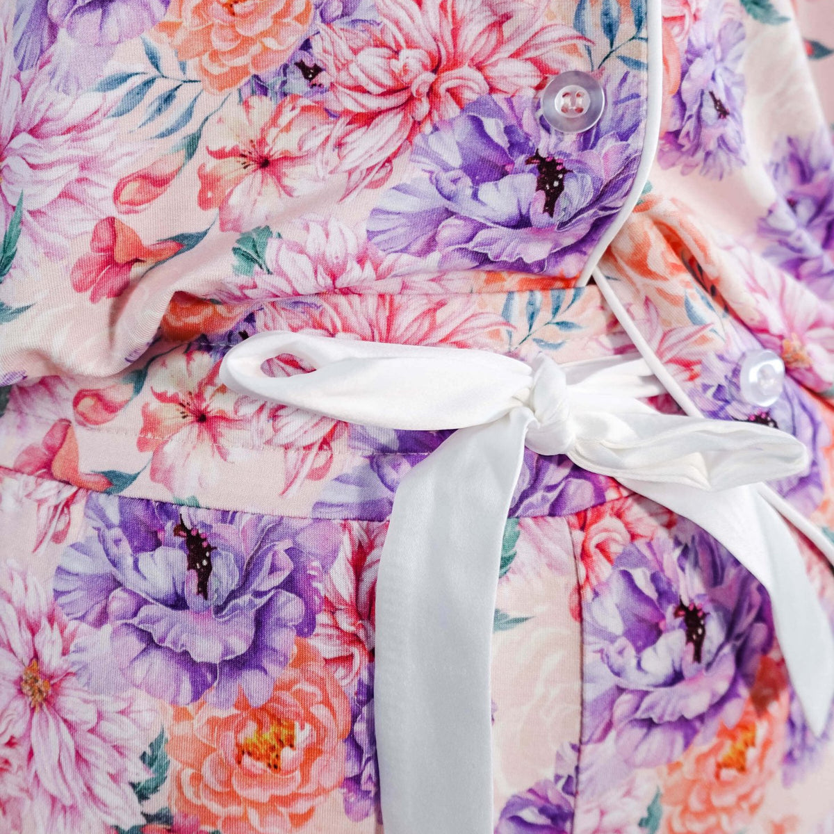 Dream in Blooms Long Sleeve Button Up & Pant Bamboo Lounge Set featuring floral design and white tie detail.