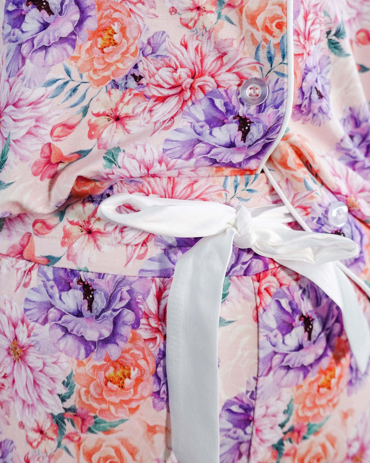 Dream in Blooms Long Sleeve Button Up & Pant Bamboo Lounge Set featuring floral design and white tie detail.