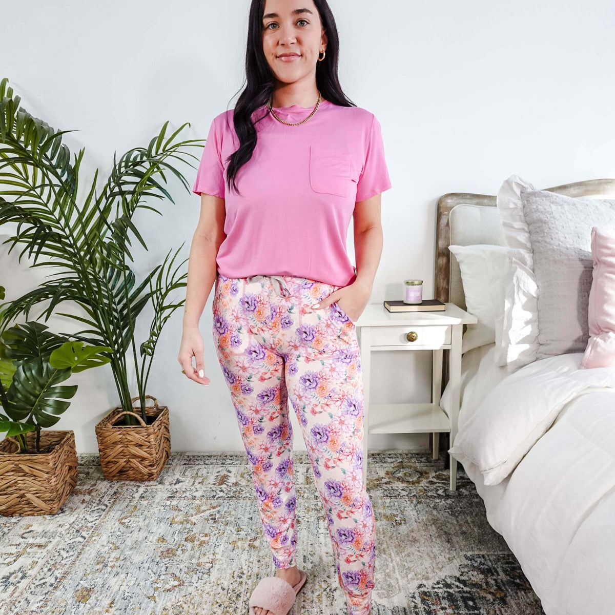 Model wearing Dream In Blooms Tee & Jogger Bamboo Lounge Set, featuring bubblegum pink tee and floral joggers.
