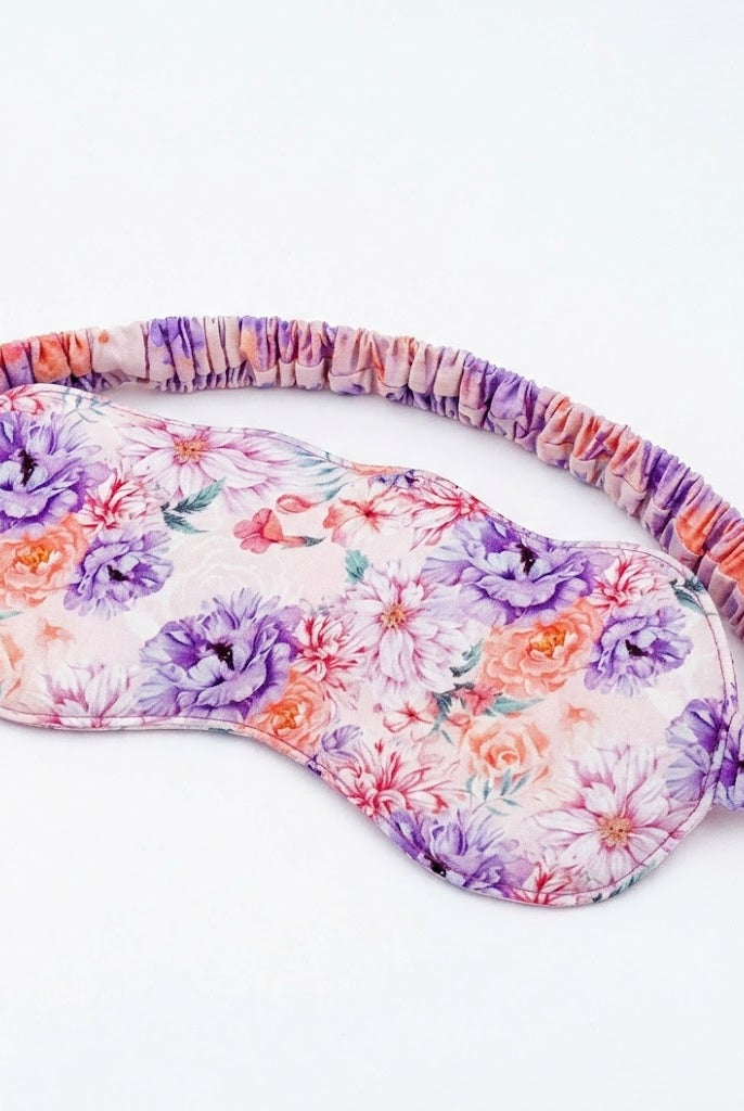 Dream in Blooms Bamboo Eye Sleep Mask featuring a floral pattern for blissful slumber and restful nights.
