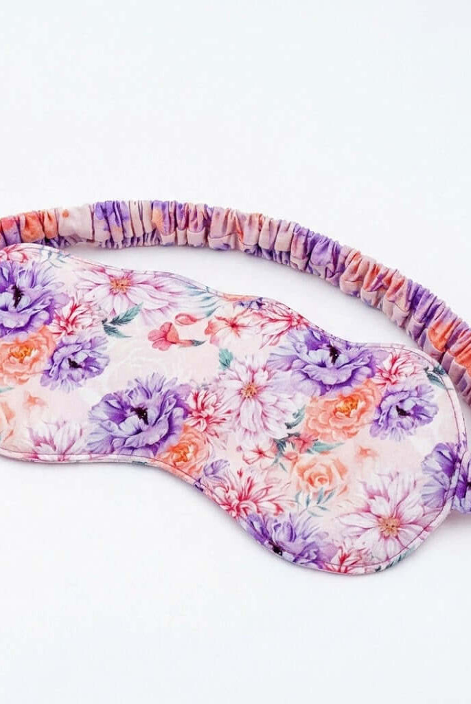 Dream in Blooms Bamboo Eye Sleep Mask featuring a floral pattern for blissful slumber and restful nights.