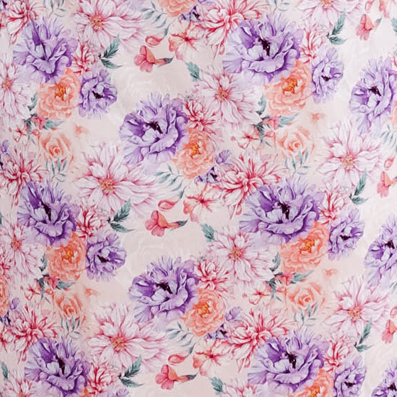 Dream in Blooms floral pattern featuring vibrant purple and pink flowers with butterflies.