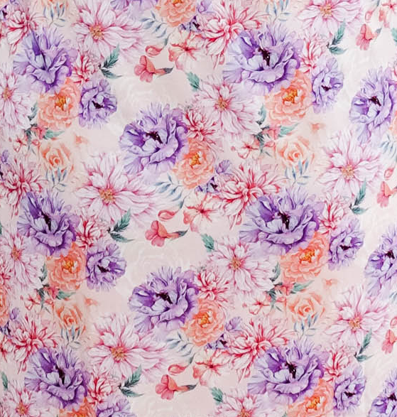 Dream in Blooms floral pattern featuring vibrant purple and pink flowers with butterflies.
