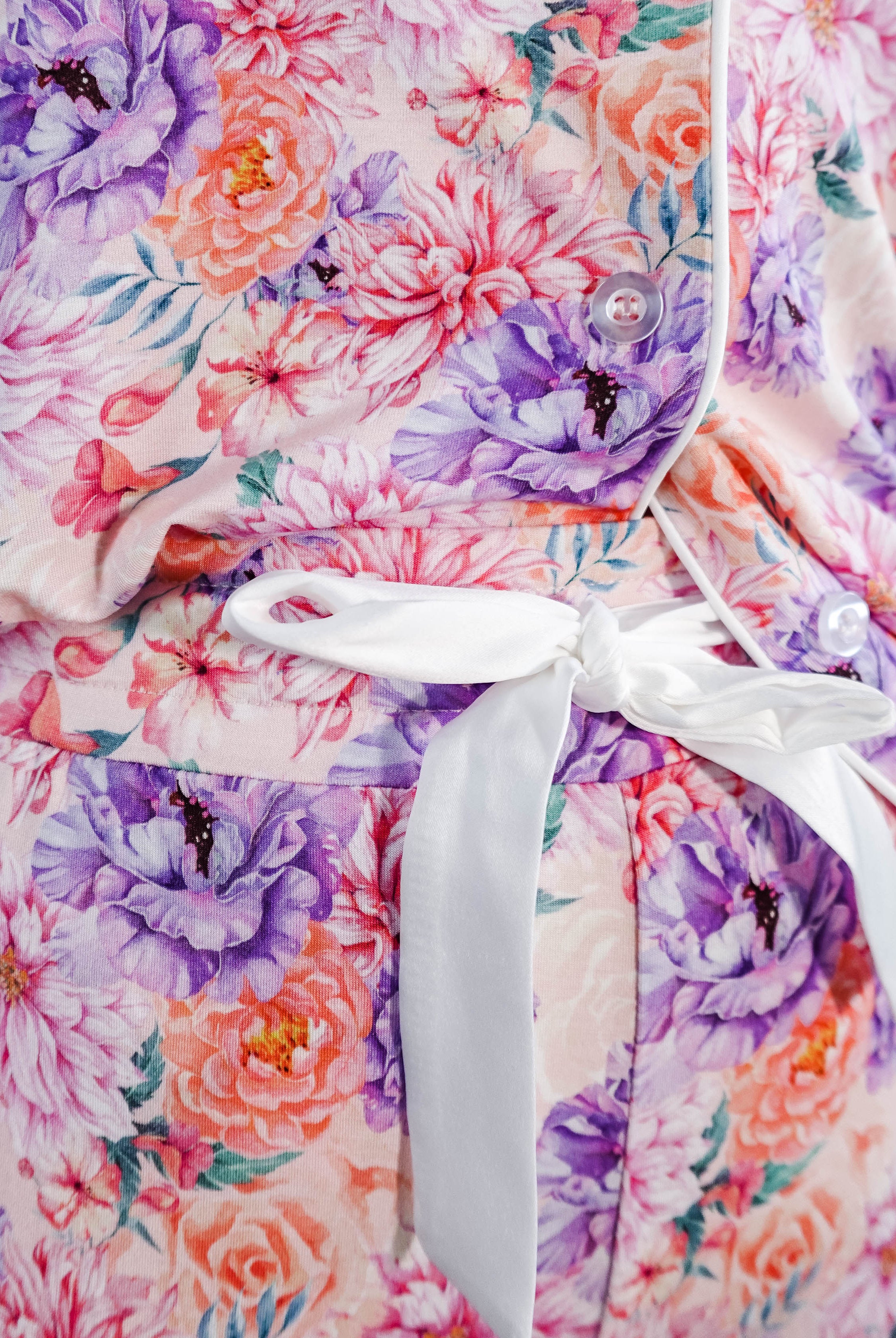 Dream in Blooms Long Sleeve Button Up & Pant Bamboo Lounge Set featuring floral design and white tie detail.