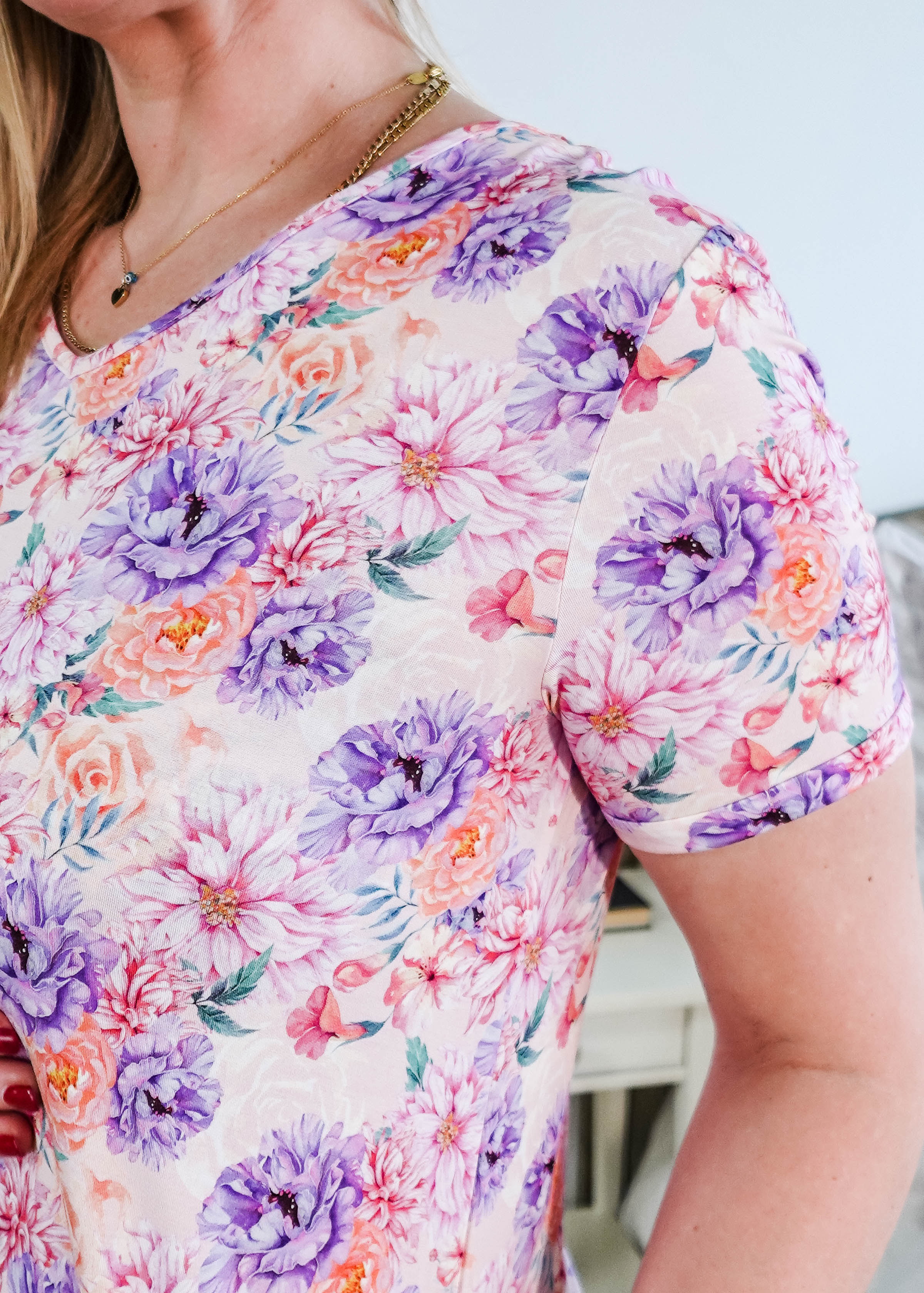 Close-up of the floral print on the Dream in Blooms V Neck Nightshirt With Pockets, showcasing vibrant colors and design.