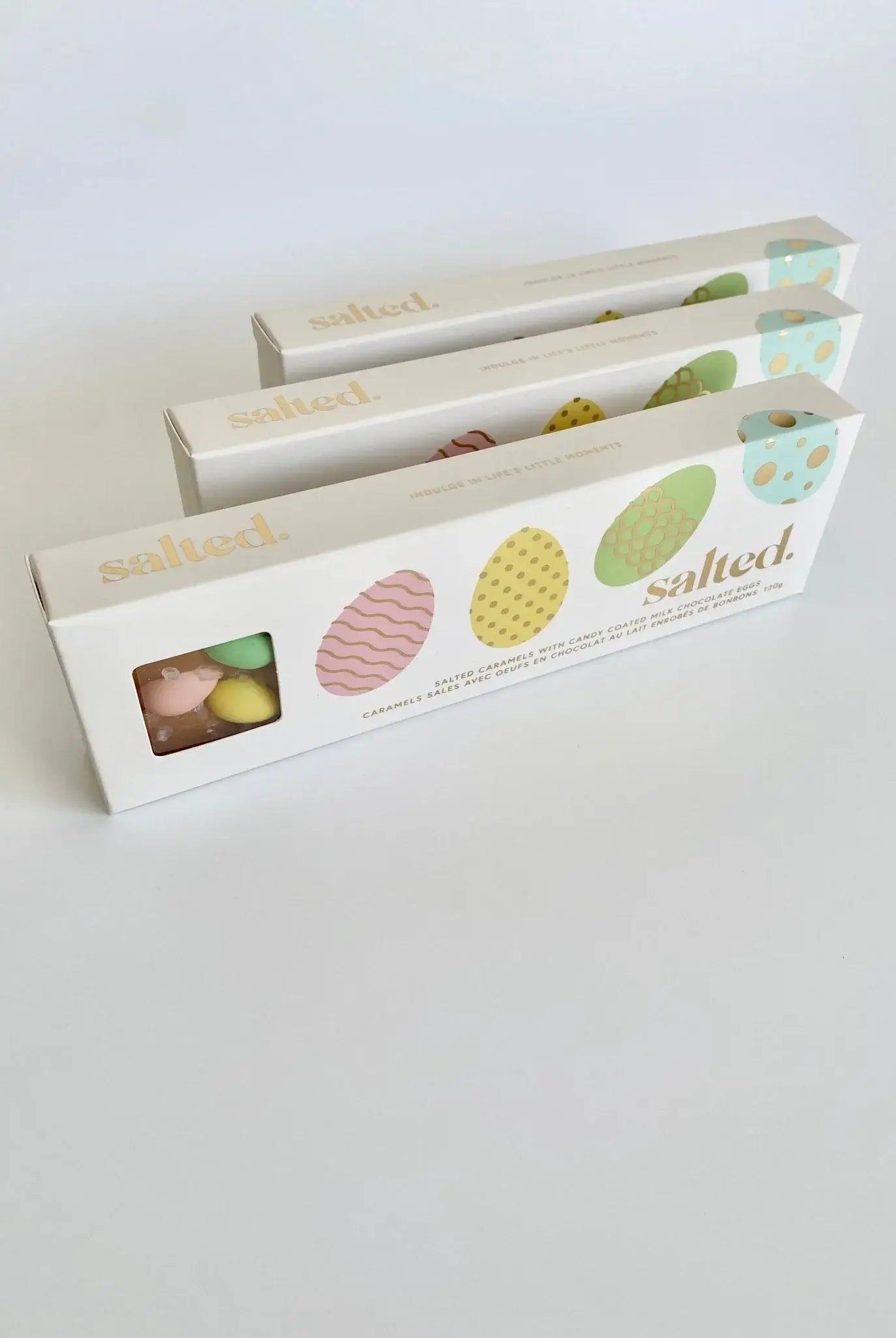 Easter Egg Salted Caramel - 4 piece box featuring colorful candy-coated chocolates.