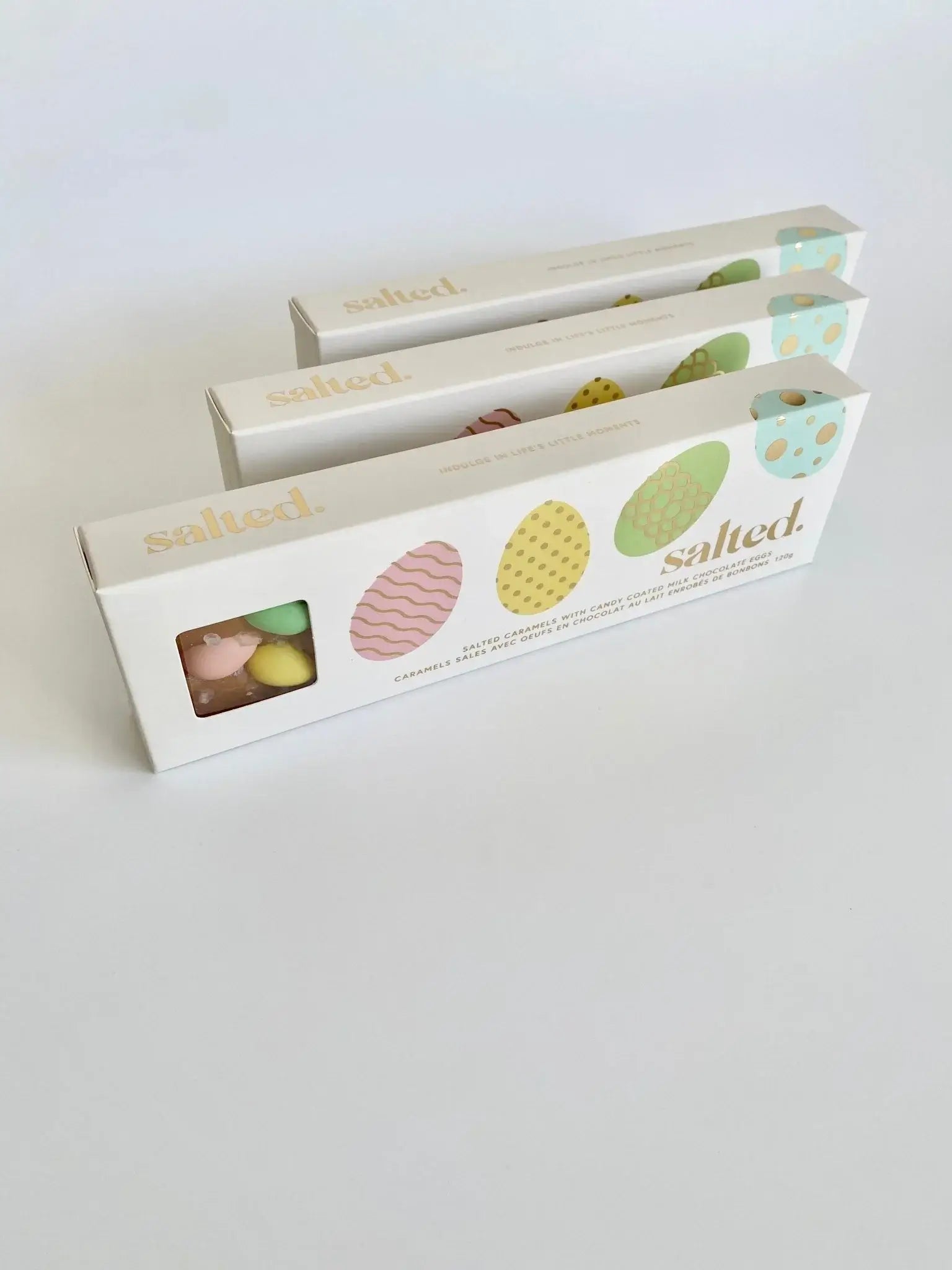 Easter Egg Salted Caramel - 4 piece box featuring colorful candy-coated chocolates.