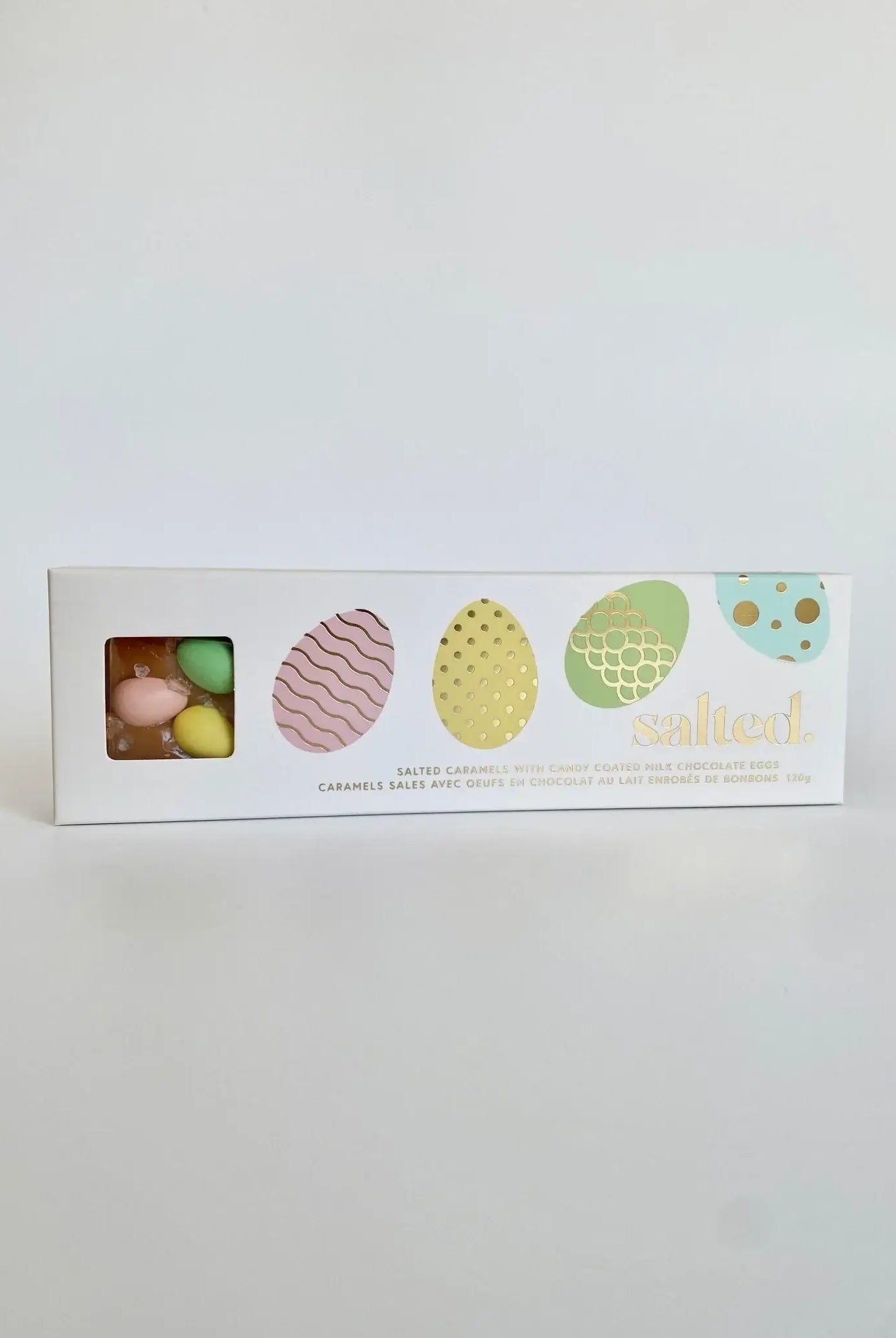 Easter Egg Salted Caramel - 4 piece box featuring colorful candy-coated chocolates.