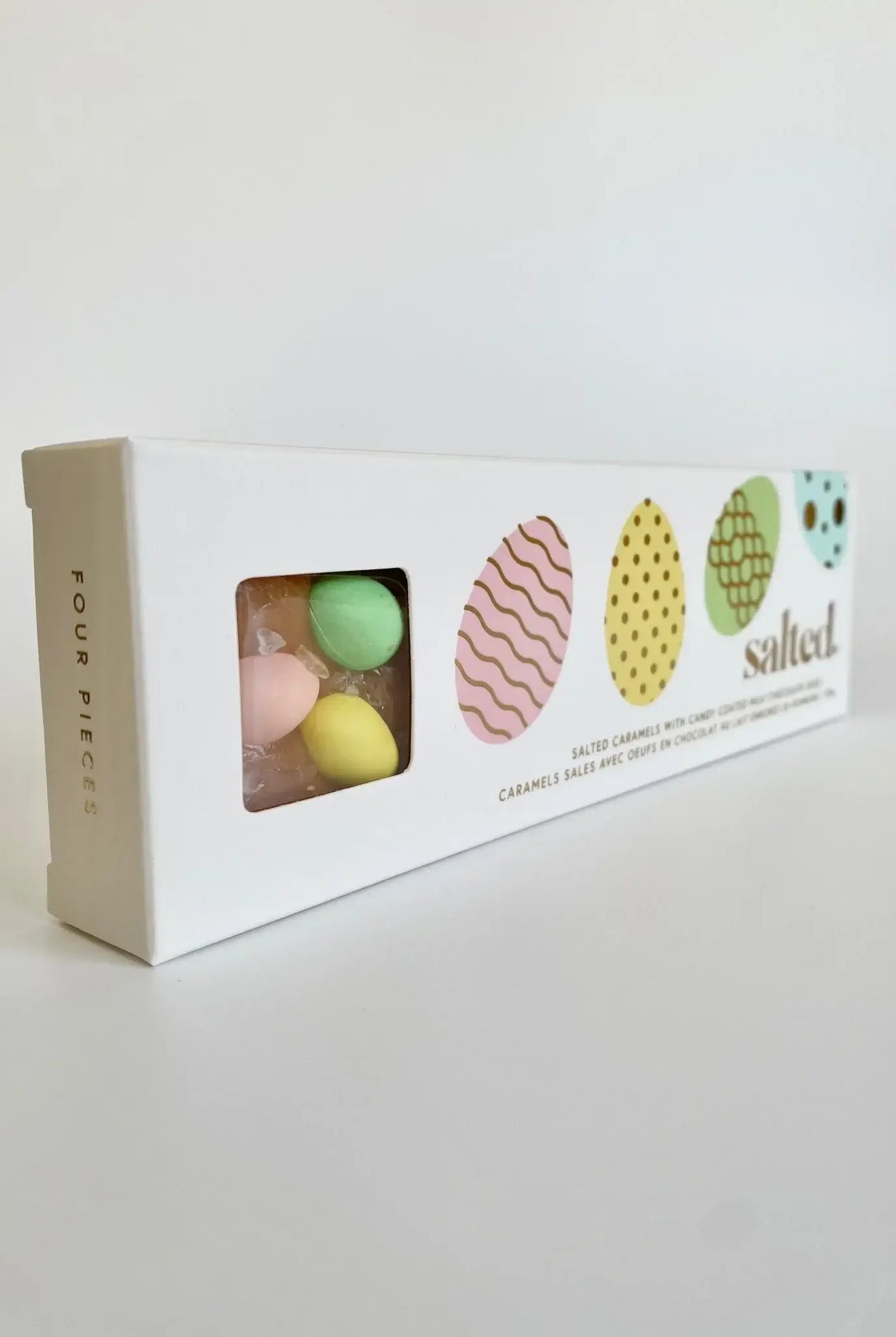 Easter Egg Salted Caramel - 4 piece box featuring colorful candy-coated chocolates.