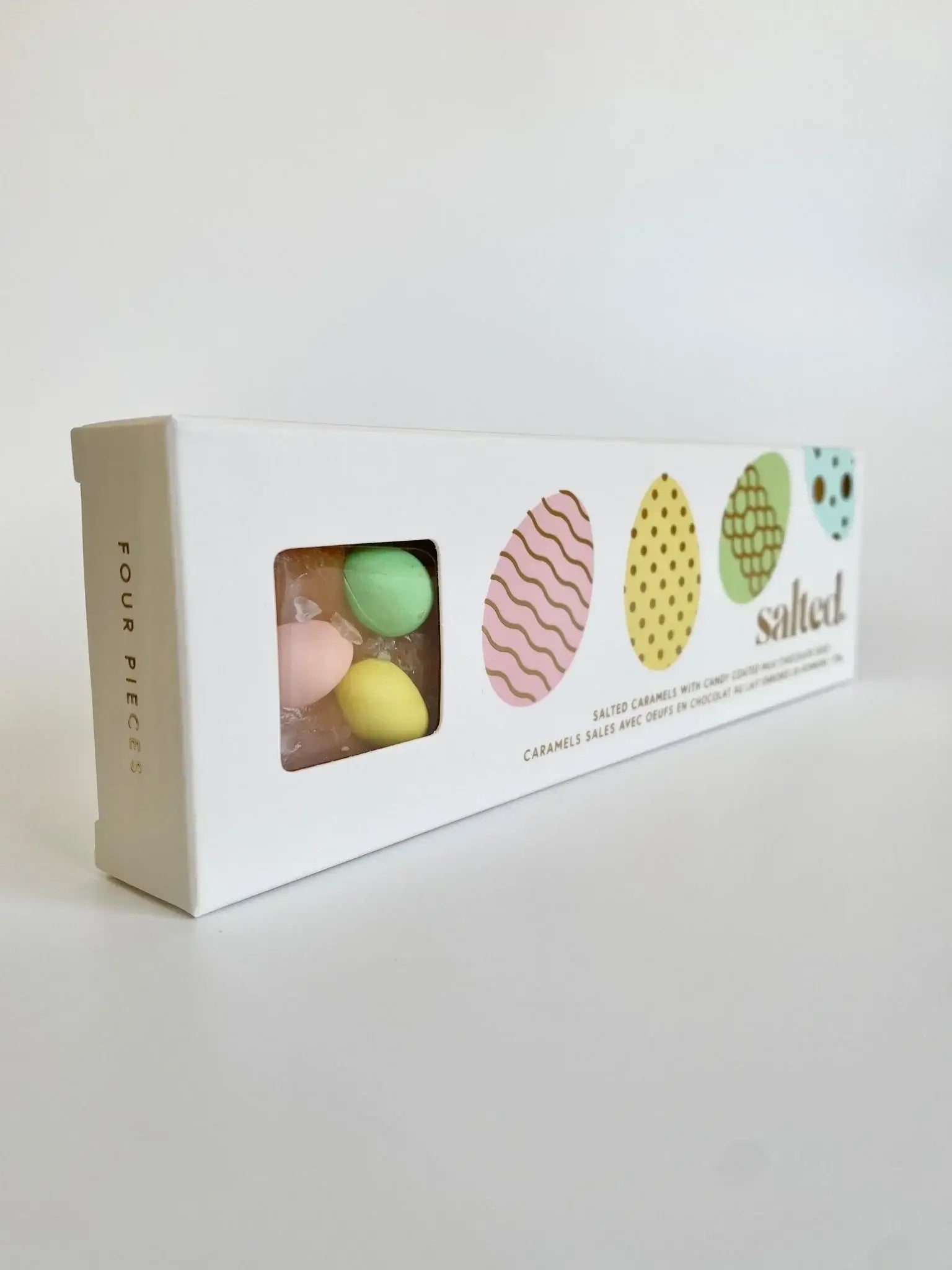 Easter Egg Salted Caramel - 4 piece box featuring colorful candy-coated chocolates.