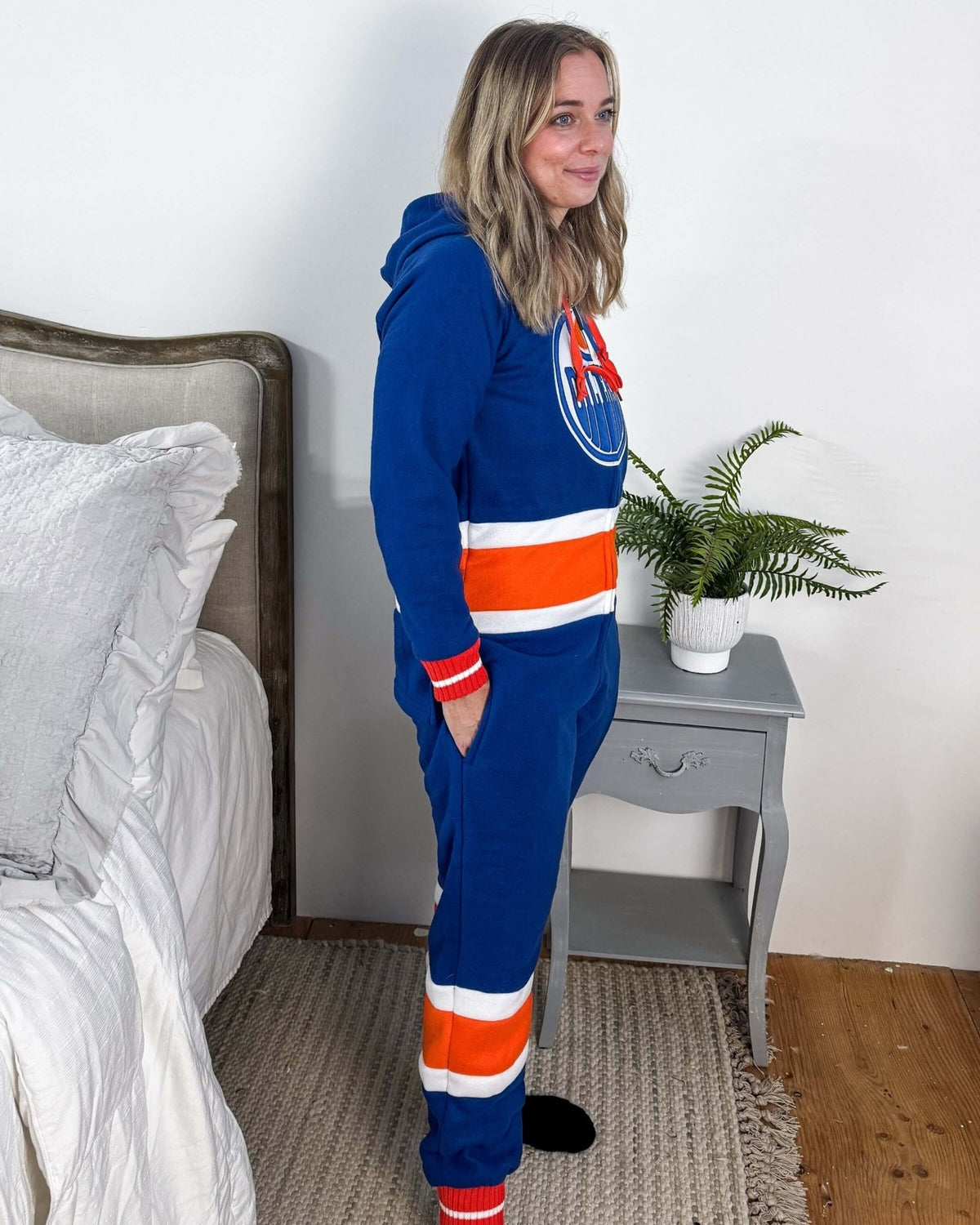 classic blue and orange side view of NHL Oilers fleece onesie