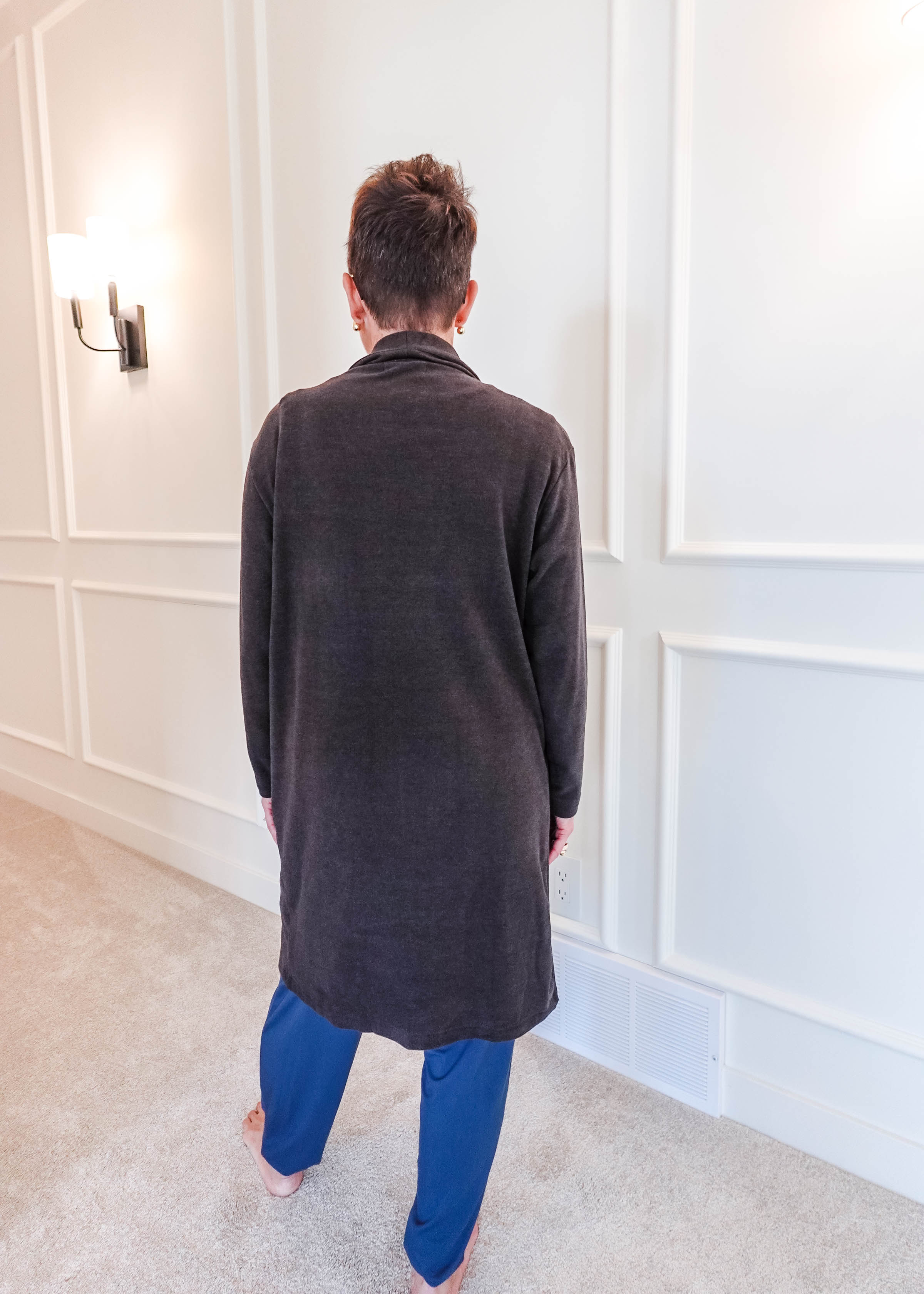 Back view of the Charcoal Elevate Cardigan showing the elegant drape and length of the long, structured layering piece.
