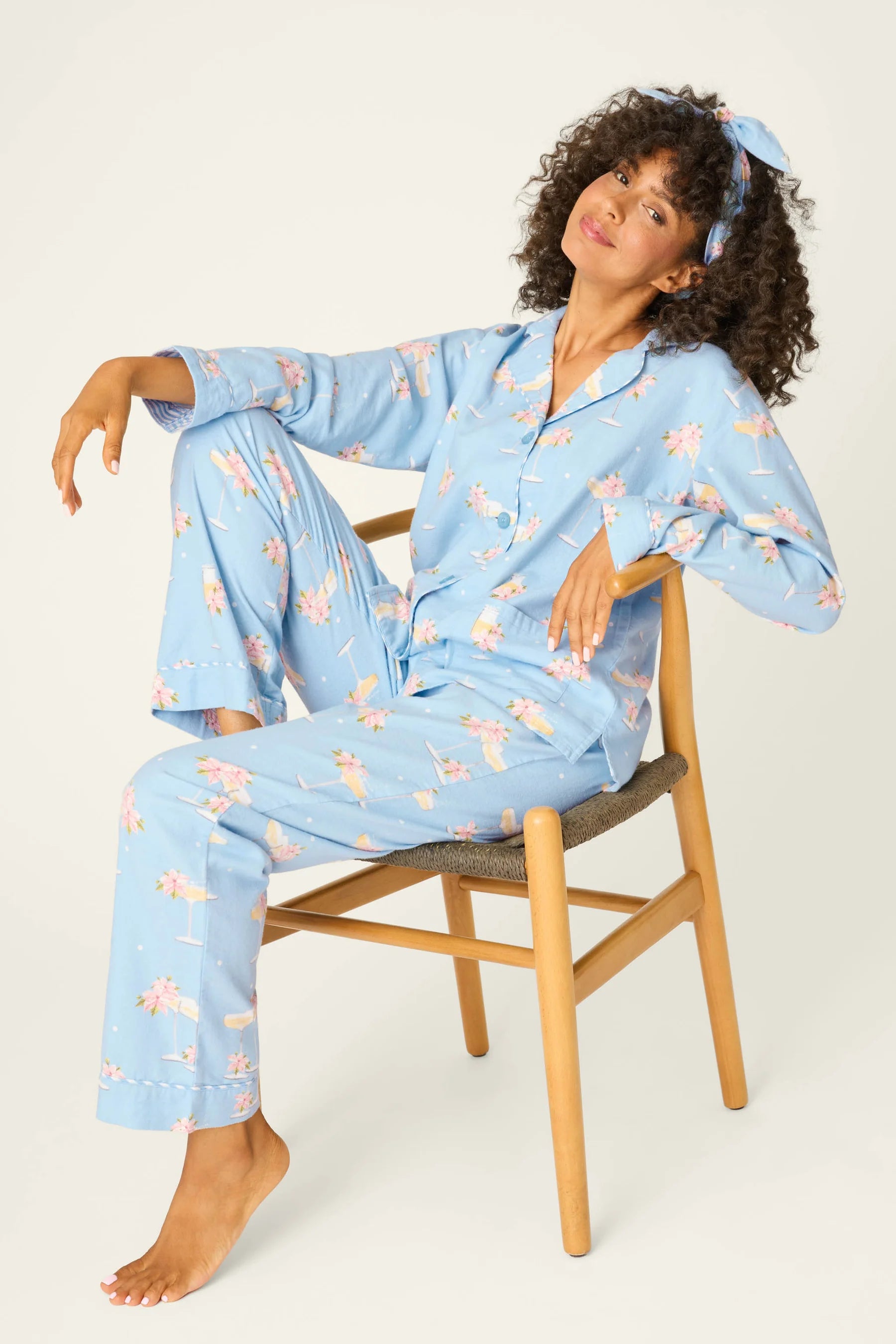 Fizz The Season Flannel Set | PJ Salvage Champagne Print Button-Up Pajamas women's light blue flannel pajamas with champagne and poinsettia print