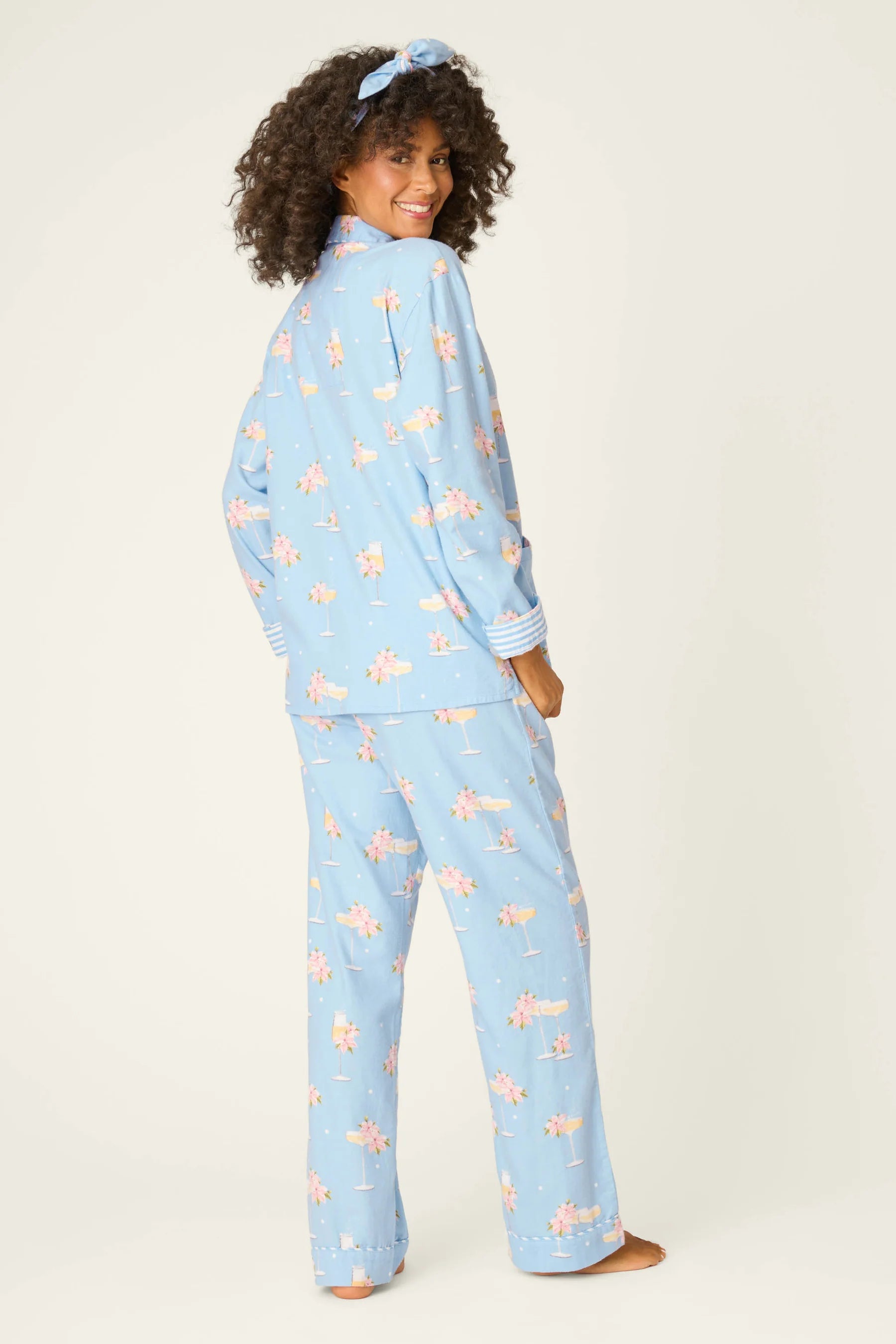 Fizz The Season Flannel Set | PJ Salvage Champagne Print Button-Up Pajamas women's light blue flannel pajamas with champagne and poinsettia print