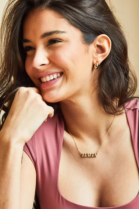Forever Mama Necklace in 14K Gold featuring balloon-style lettering spelling 'MAMA' on a delicate chain.