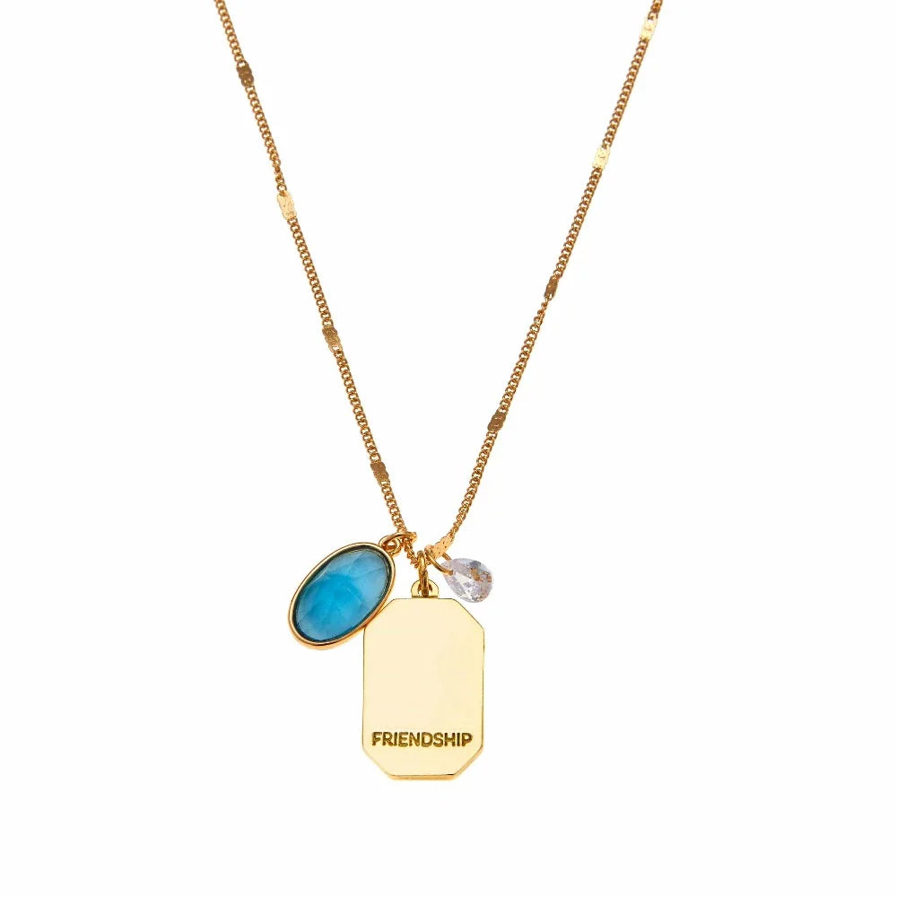 Birthstone Charm Necklace in 14k Plated Gold featuring December turquoise stone and 'FRIENDSHIP' intention word by Foxy Originals.