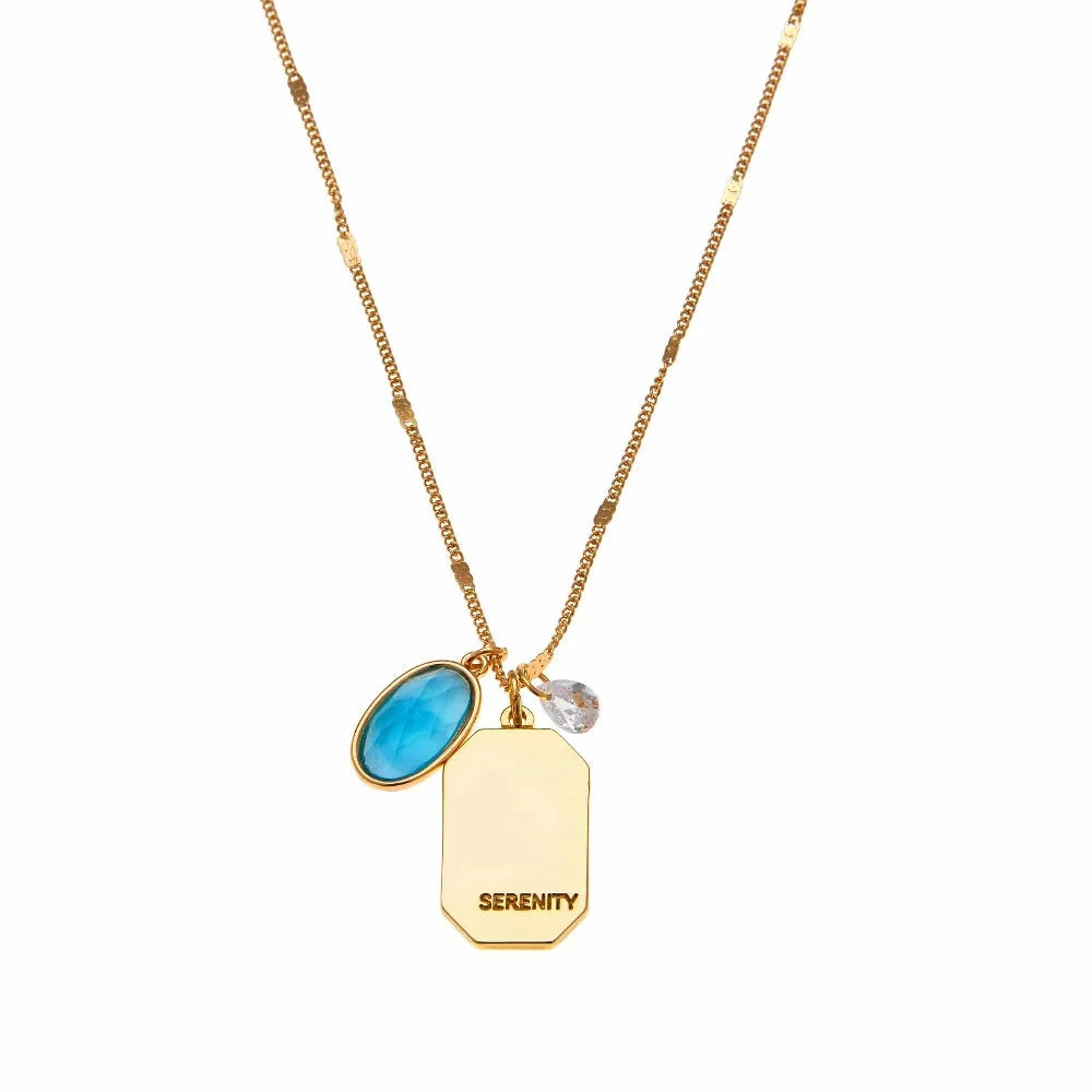 Birthstone Charm Necklace in 14k Plated Gold featuring aquamarine stone and serenity intention for March.