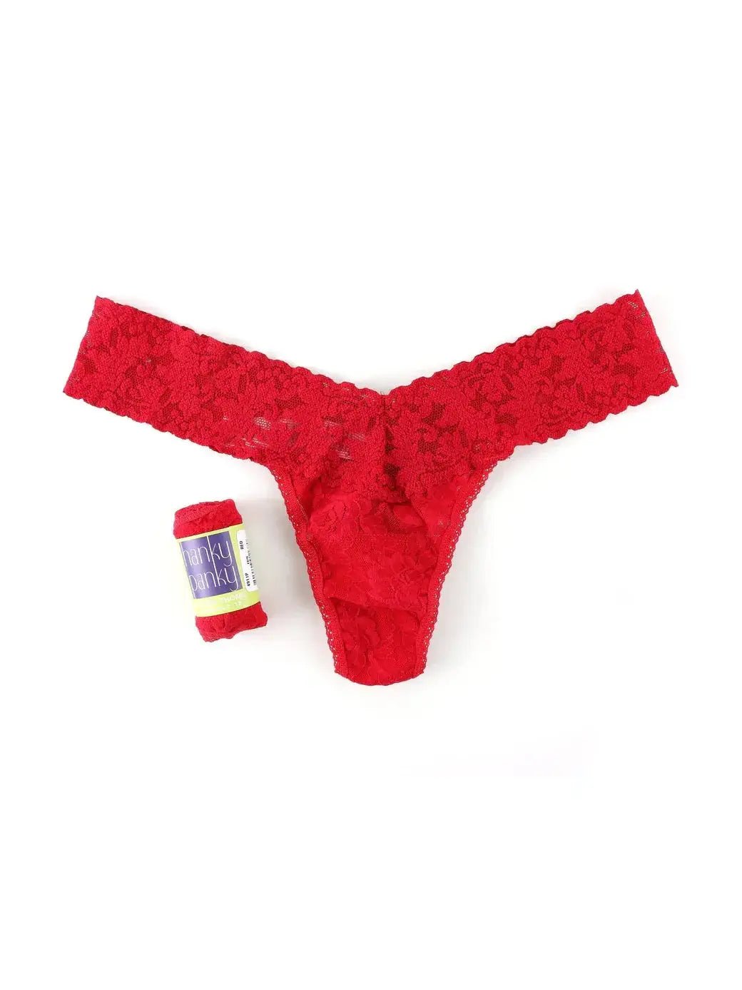Hanky Panky Low Rise Thong in red lace next to a gift-ready wrap, perfect for special occasions.